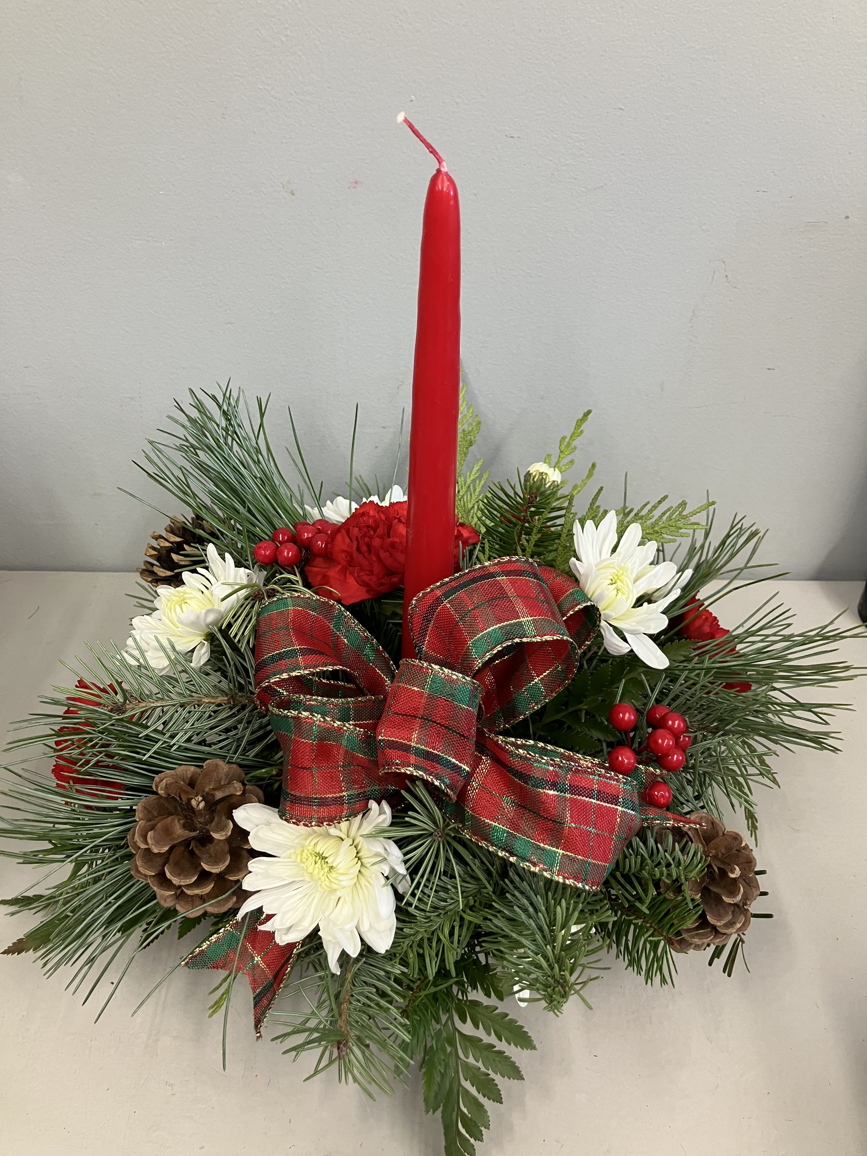 Holiday Centerpiece  - Gorgeous fresh greenery with red berries, ribbon and pine cones and a taper candle. Handcrafted with care! 
