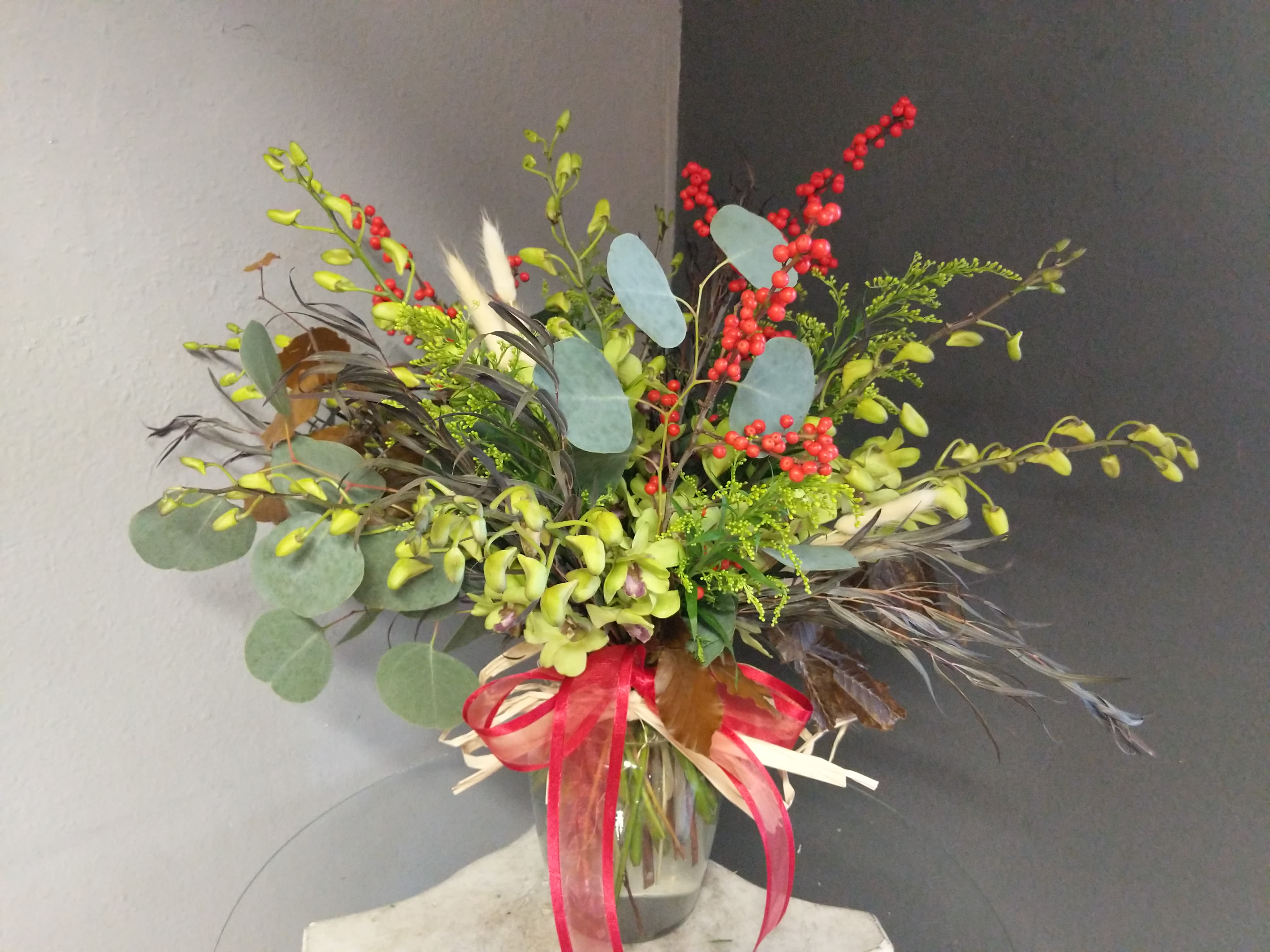 # 120 Winter Floral Arrangement - A beautifully selected bunch of the freshest flowers in a vase uniquely arranged by hand.