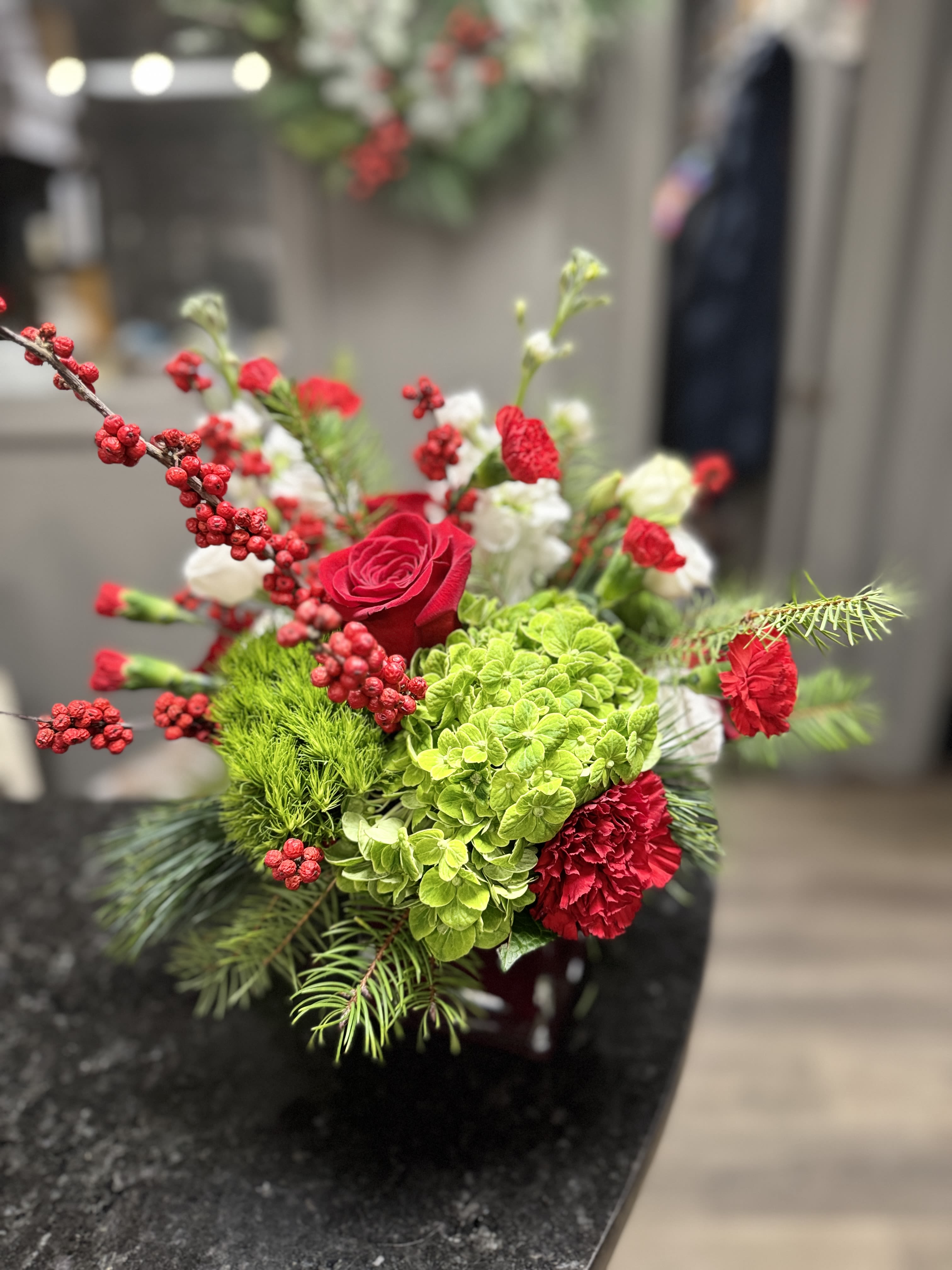 Tis the Season - A beautiful green, red and white simply adorable Christmas Arrangement adding to the glow of the Season.
