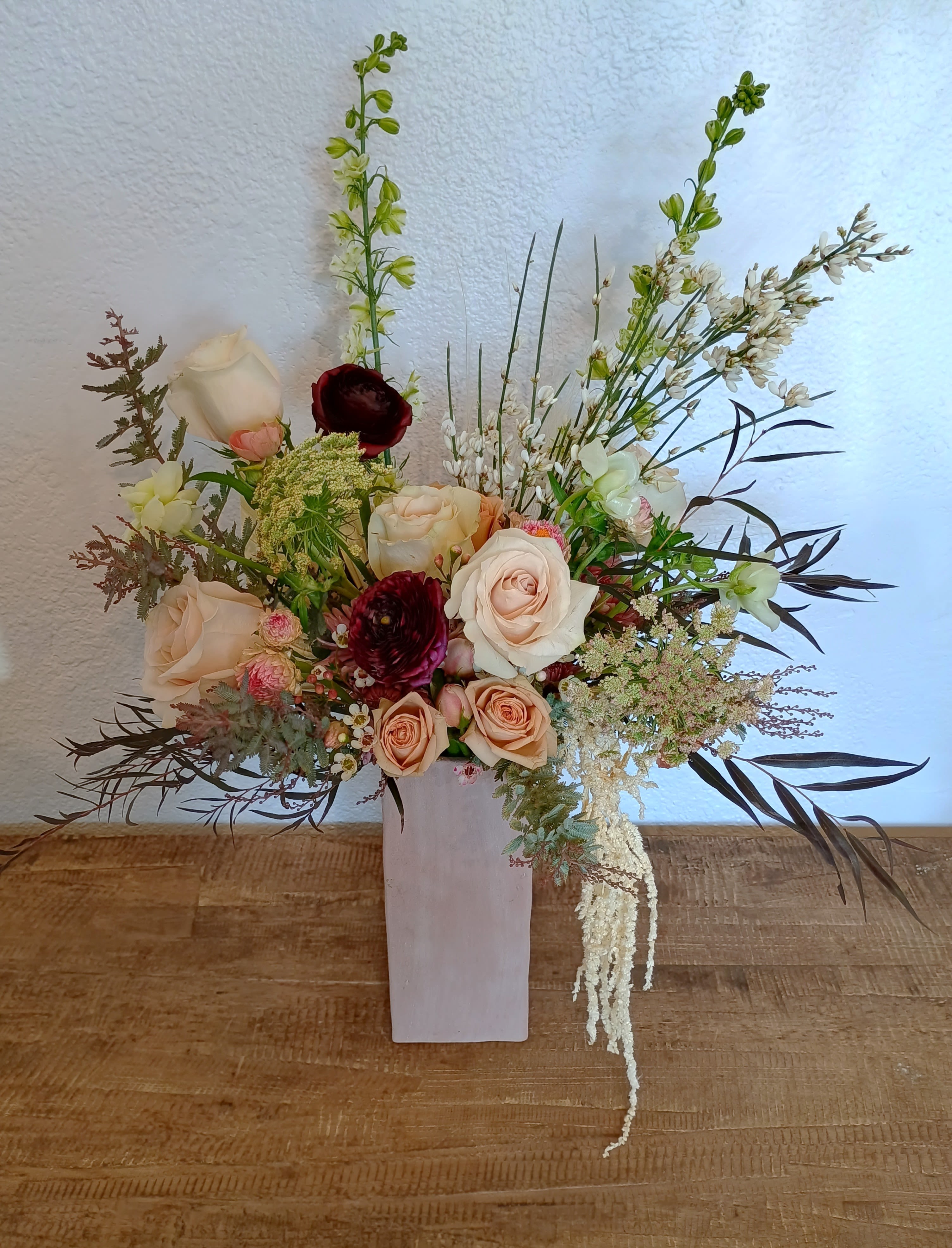 Soft Rose - A combination of soft toned fresh flowers and neutral dried flowers that comes in a dusty rose clay vessel.   *please note that not all the same flowers may be available to be included but we will always keep the overall look and feel in cases of substitution. 