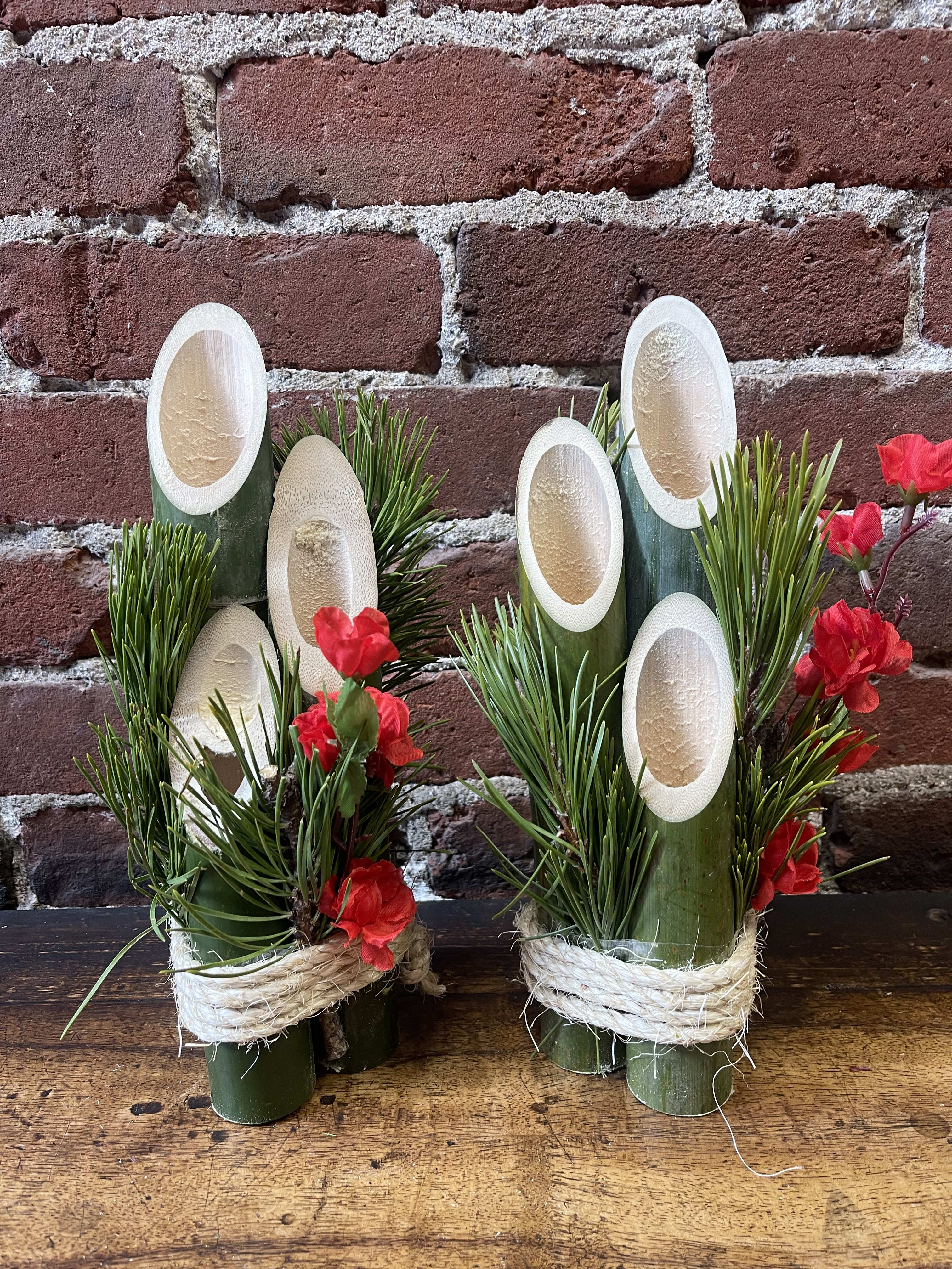 12” Kadomatsu Gate Pine Pair KADO2301 - Traditional Japanese Kadomatsu known as Gate Pine門松 hand crafted by Flower Fair.  It is good luck decoration to bring in New Year. Usually place in household by a pair. Color and size of bamboo varies by nature. 