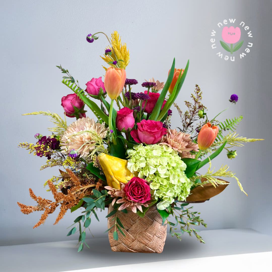 Fall-a-la-la-la - Recipe: Hydrangae, Roses, Amaranthus, Tulips Chrysanthemums, Gourd and more in a square, brown vase. Seasonal: Autumn Orientation: Front Facing View Photo shown: Standard 