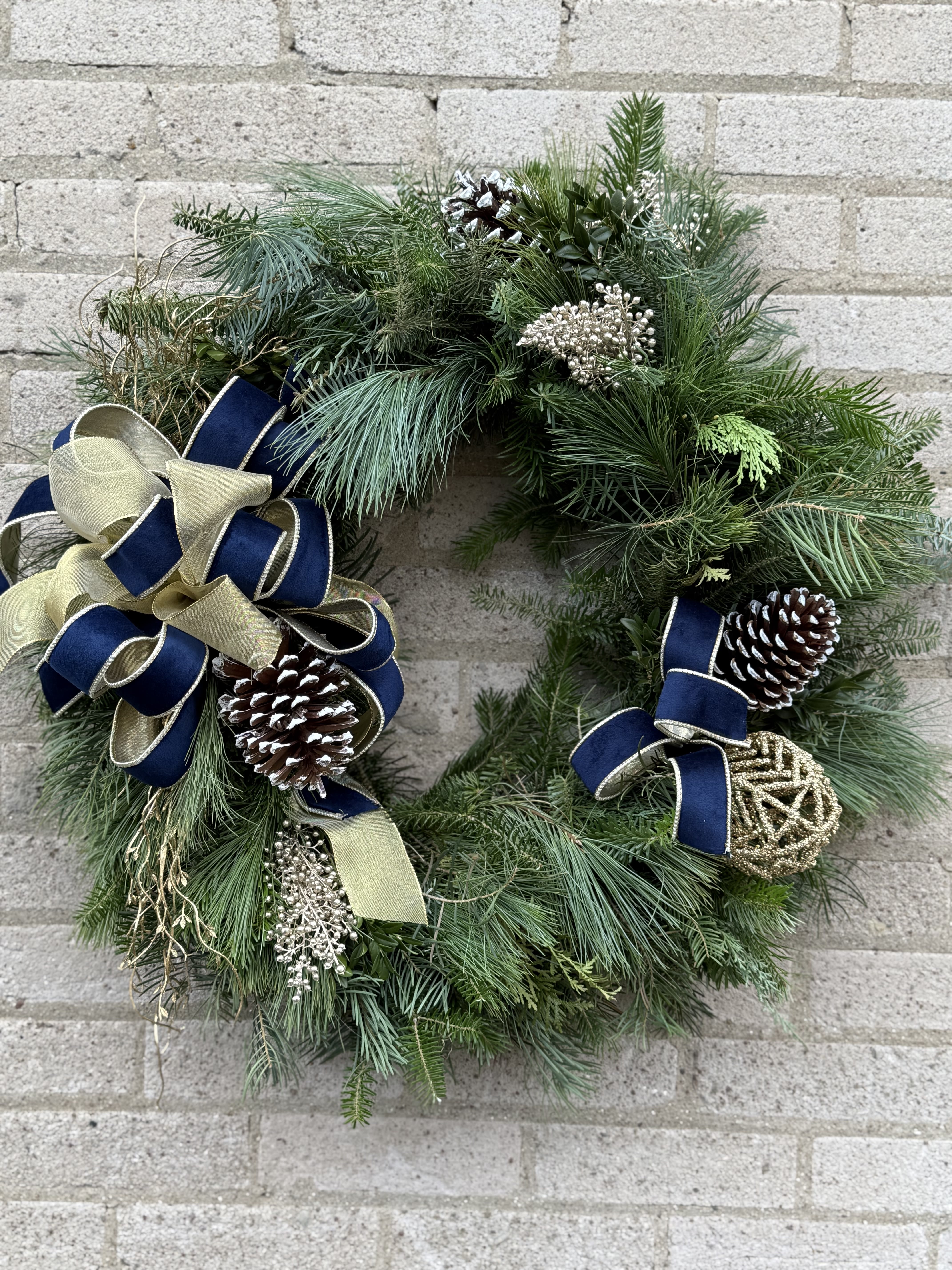 Holiday Wreath - A beautiful custom fresh wreath, perfect for the holidays. Brighton your front door or gate. This is a perfect gift for the holidays.
