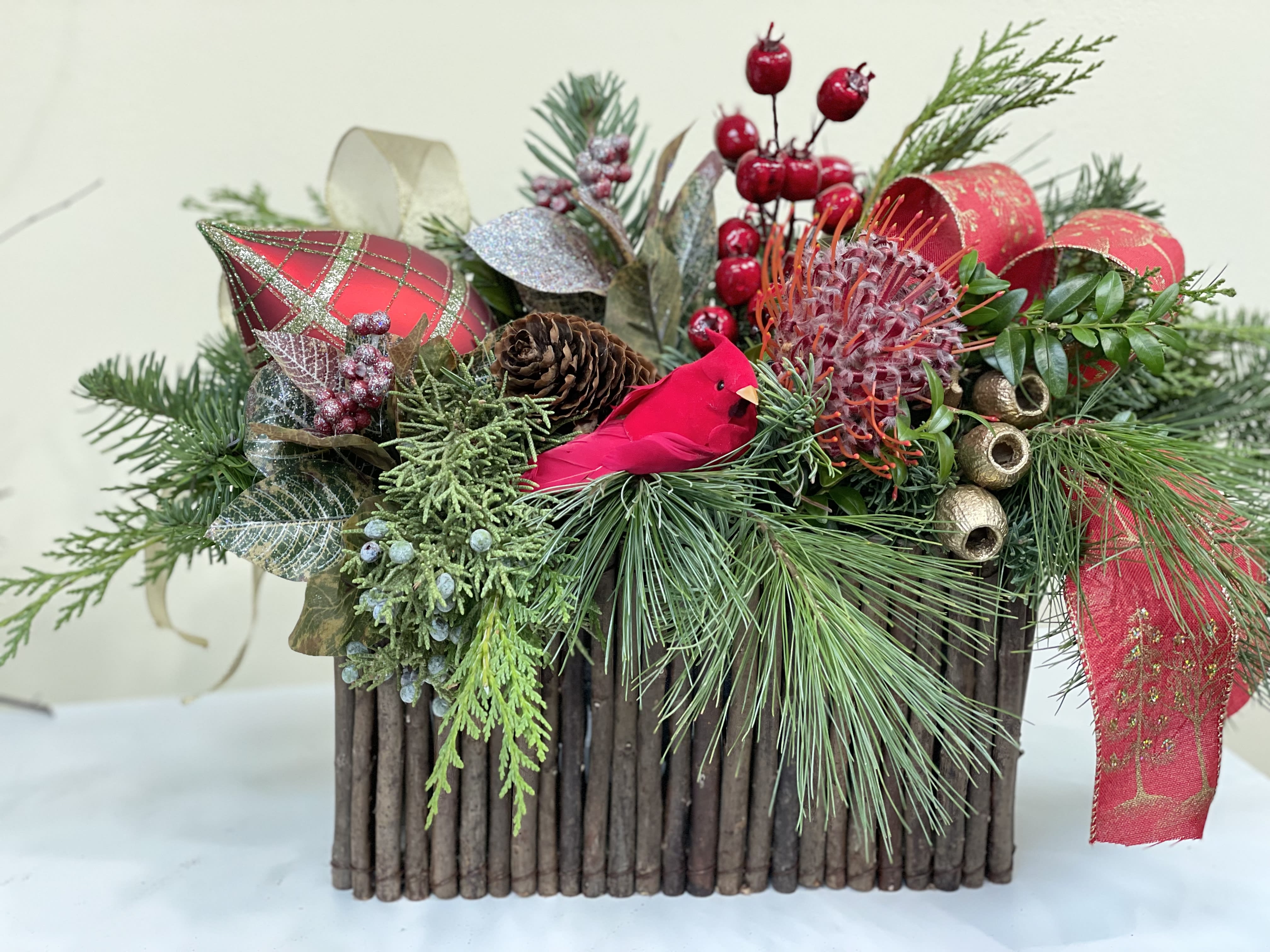 Christmas Table Centerpiece - A beautifully custom designed centerpiece, it would look beautiful on any Christmas table. We use winter greens, textural and traditional Christmas elements. The container will be different to the picture as we have had a huge demand for this centerpiece but everything else will reflect the picture.