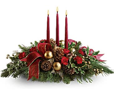 All Is Bright - All is calm, all is bright…well, at least we can promise the latter with this luminous arrangement! Gather family and friends together for a holiday meal around this traditional Christmas centerpiece featuring pinecones, holly, noble fir and Christmas candles. 'Tis the season to shine!