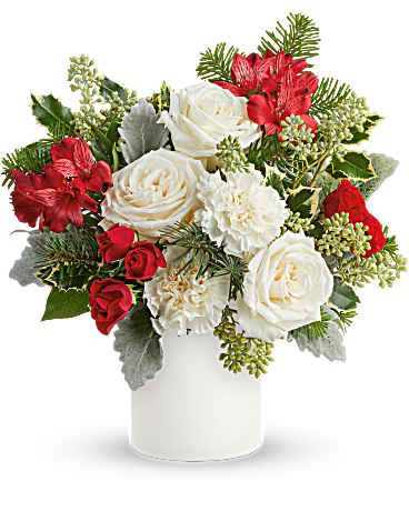 Holiday Joy Bouquet -  Holiday Joy Bouquet captures Christmas cheer with white roses, red blooms, and festive evergreens . A beautiful holiday gift or cozy, elegant winter centerpiece.