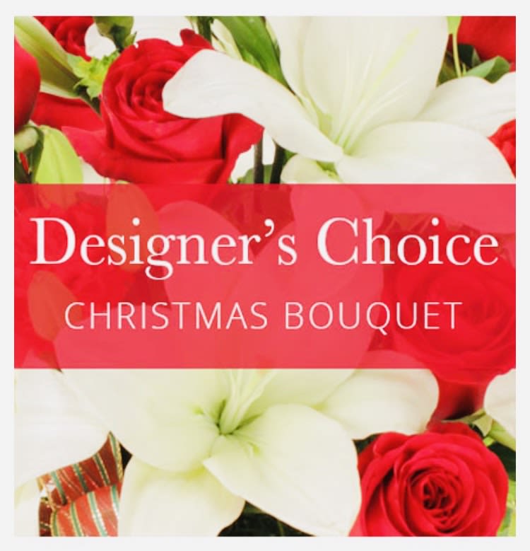 Holiday Extravaganza - If your in the mood to splurge this holiday, this is the selection for you. Christmas with class and extravagance. Send this designers choice holiday bouquet to the one you'd most like to impress and we will design a custom holiday arrangement just for you!