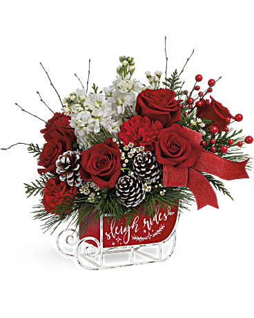 Teleflora's Christmas Day Sleigh Bouquet - Like a snowy sleigh ride through a frosty forest, this fun-filled Christmas gift is pure delight, featuring a beautiful holiday bouquet lovingly arranged in a vintage metal sleigh. White stock, red carnations and white waxflower are arranged with birch, white pine and cedar. Delivered in Teleflora's Vintage Sleigh Ride Keepsake.