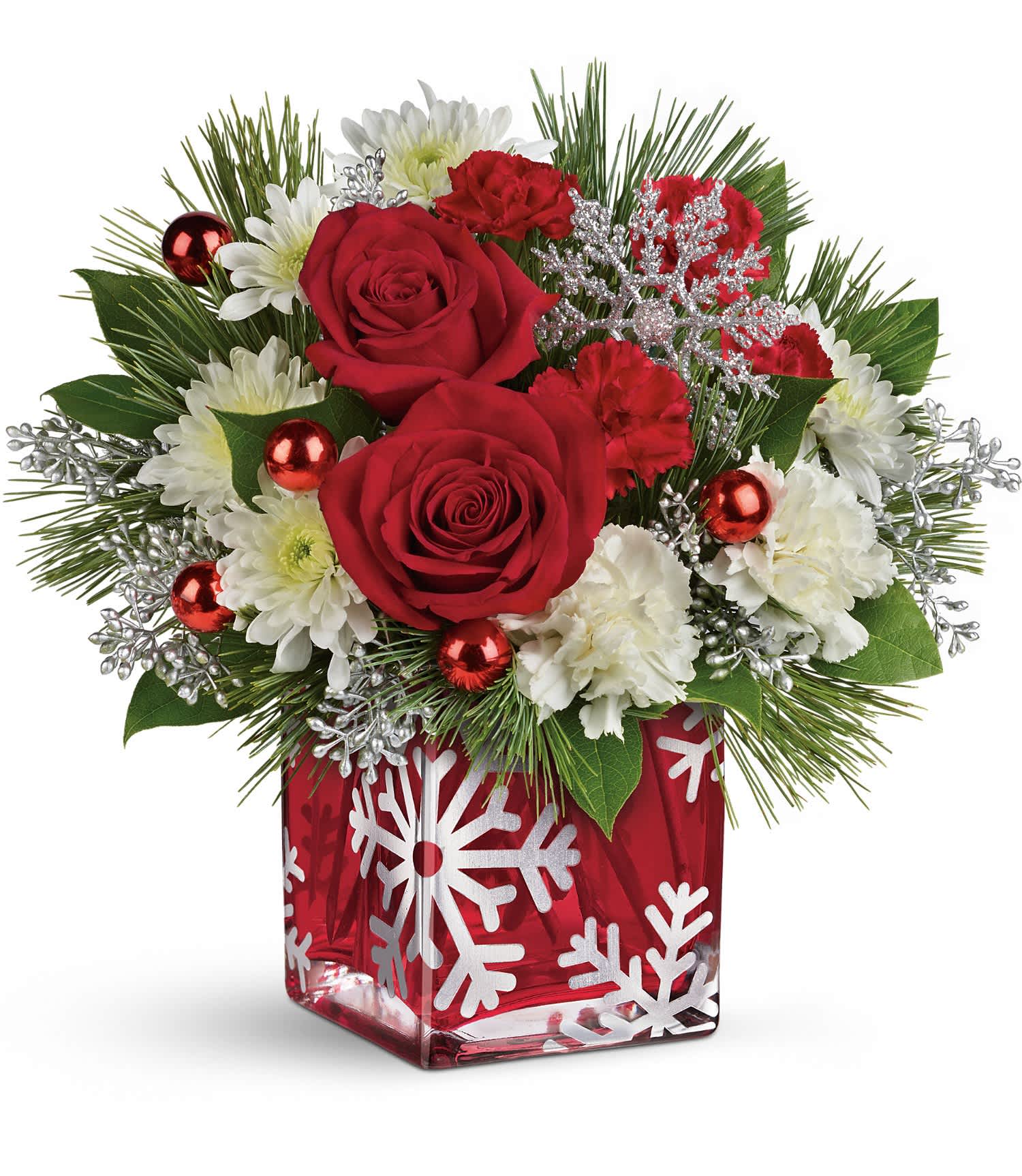 Teleflora's Silver Christmas Bouquet - This elegant bouquet includes red roses, white carnations, white cushion spray chrysanthemums, seeded eucalyptus, white pine and lemon leaf. Delivered in a Silver Christmas Cube. Approximately 12 3/4&quot; W x 12&quot; H