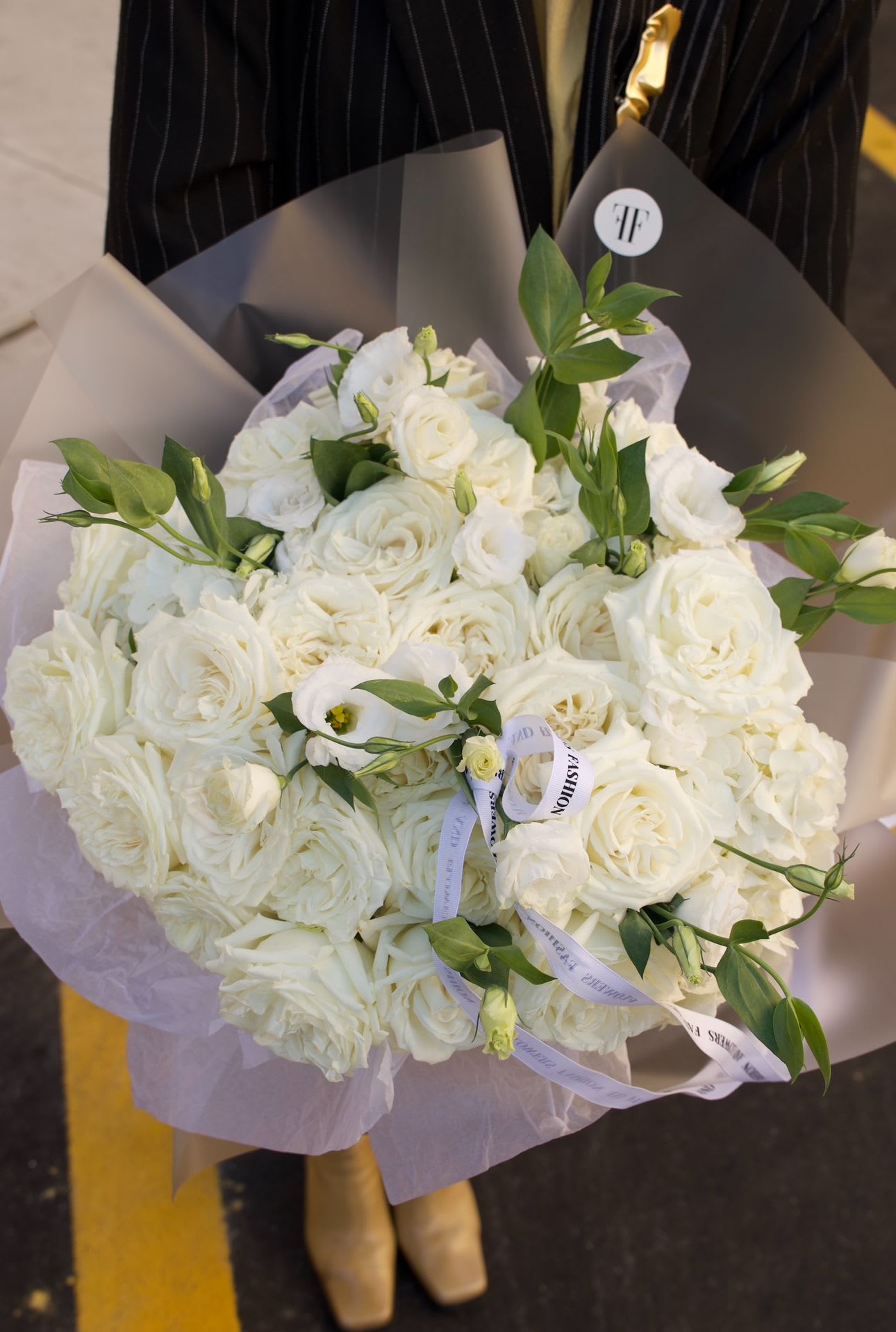Ivory Dream - A premium all-white bouquet featuring garden roses, lisianthus, and fresh hydrangea. Designed in our signature clean, modern style and wrapped in luxury editorial packaging. This arrangement is perfect for birthdays, anniversaries, thank-you gifts, or any elegant occasion. Same-day delivery available in New York and New Jersey.  A complimentary vase is included with every arrangement. 