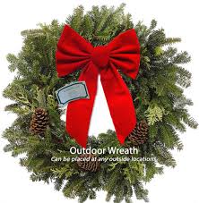 22 in Fresh Noble Fir Mixed Wreath - Made out of Noble fir, cedar, and pine cones.  Bow included