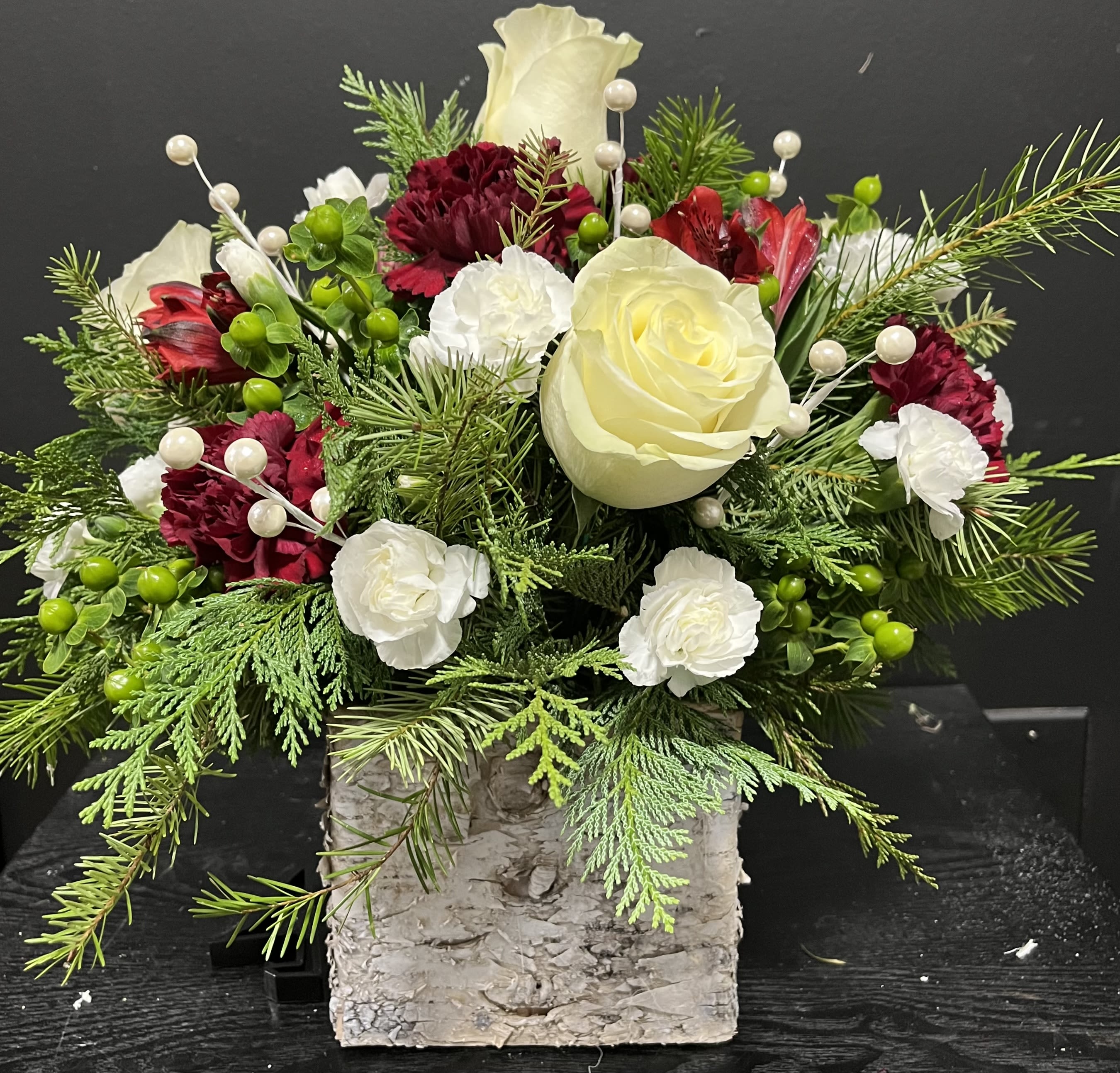 Bursting with Christmas - Christmas greens set in a 5 x 5 birch box