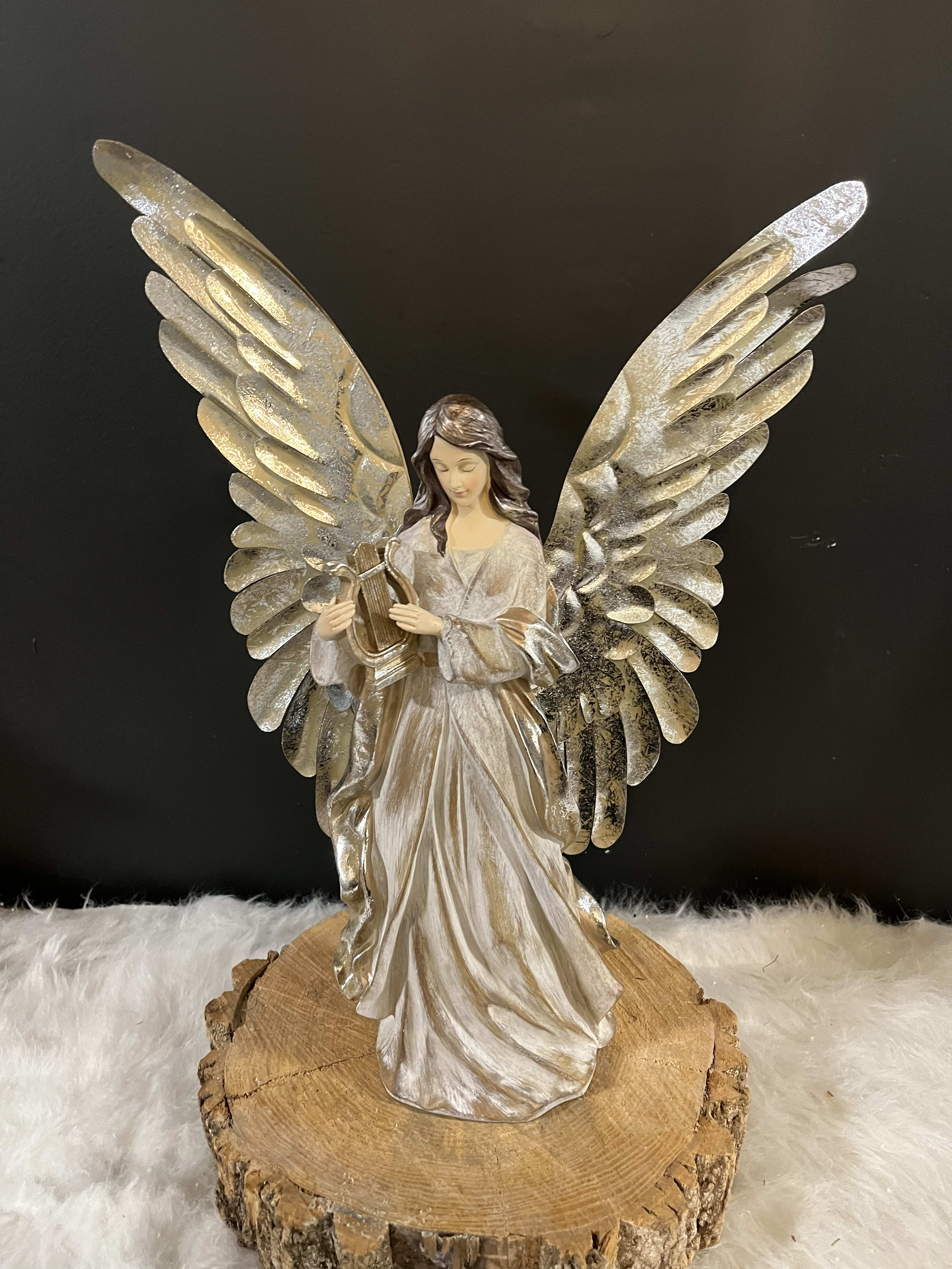 Holiday Angel - Beautiful Metal Angel stands about 12 in tall, playing a horn.