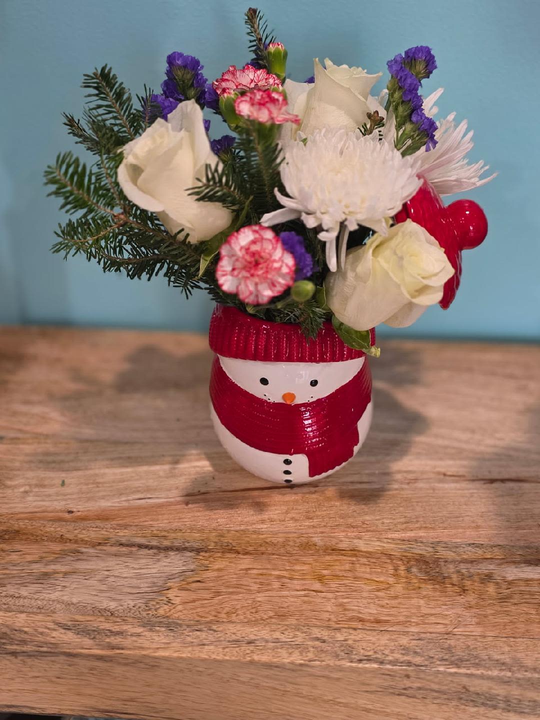  Rudolph’s Winter Magic - Beautiful Christmas arrangement arranged and a snowman cup.