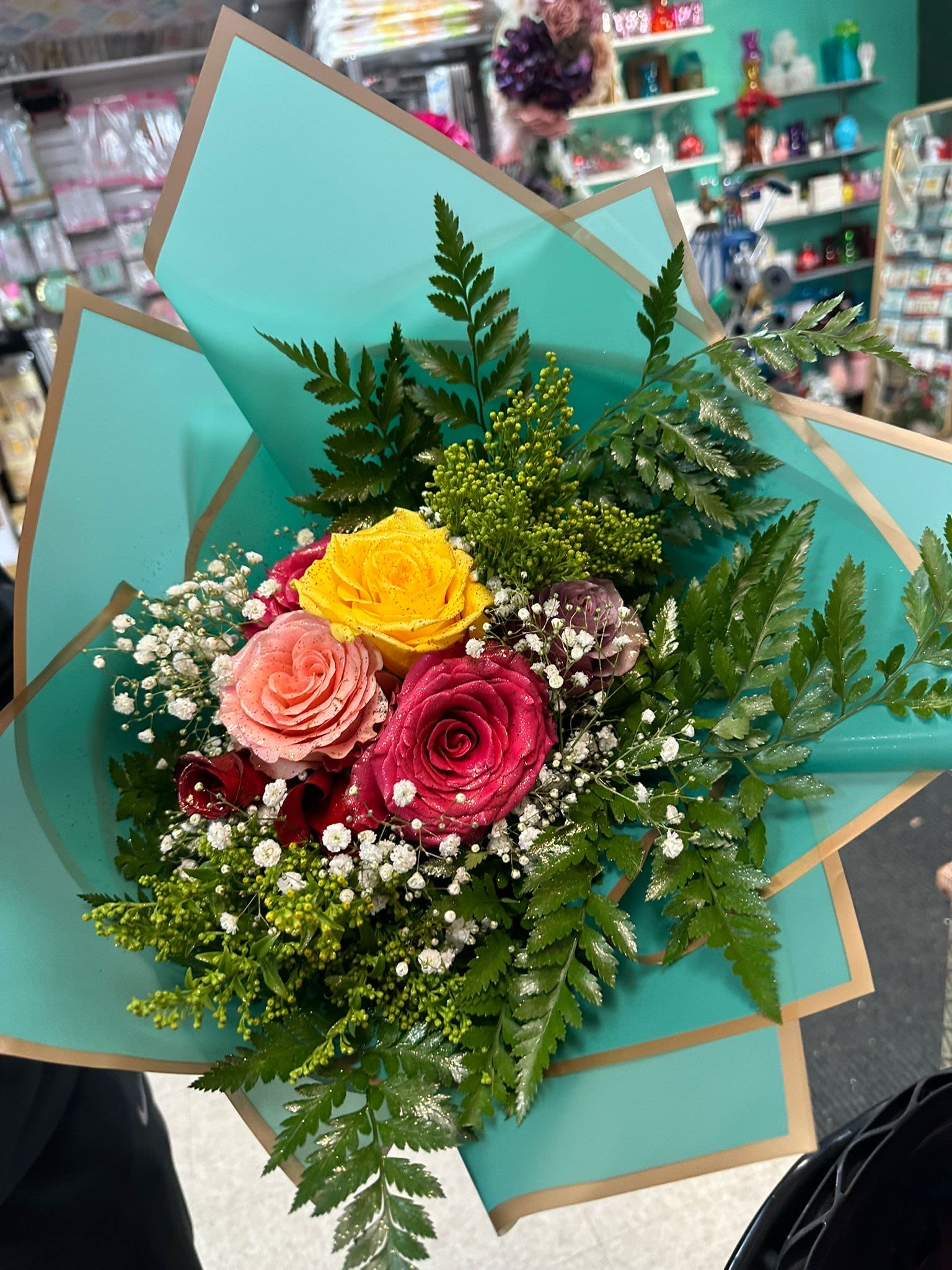 Pedal Parade  - The Pedal Parade is a stunning display of nature's most gorgeous blooms. This bouquet is a feast for the senses, with the intoxicating fragrance of roses and the cheerful pops of color that instantly elevate your mood. Whether treating yourself or gifting to a loved one, the Pedal Parade is a luxurious way to add natural beauty to any home or office.  This bouquet is perfect for anyone who appreciates the simple pleasure of fresh flowers. It's an easy way to inject some joy and vibrancy into your daily life, lifting your spirits every time you glimpse its vibrant hues. The long-lasting flowers ensure you can enjoy this stunning arrangement for days on end.