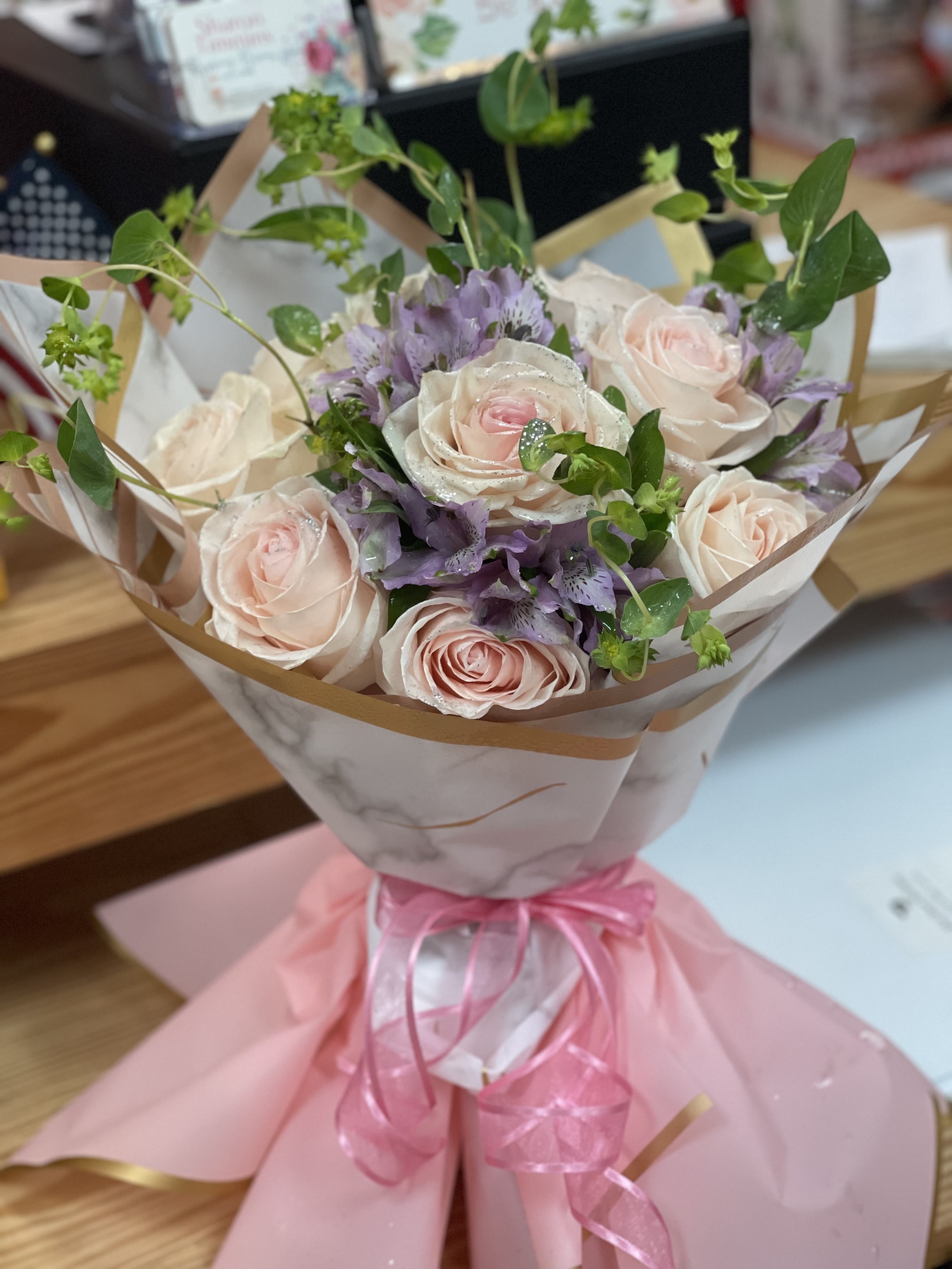 Dandelion Dreams - Dandelion Dreams is the perfect way to brighten someone's day and remind them they're cherished. The soft, delicate petals and calming lavender create an oasis of peace, while the vibrant greenery symbolizes renewal and growth. Whether you're celebrating a special occasion or just want to spread joy, this bouquet is sure to delight.  This thoughtful arrangement makes an ideal gift for birthdays, anniversaries, Mother's Day, or &quot;just because.&quot; Surprise a loved one, coworker, or yourself with the serene beauty of Dandelion Dreams.