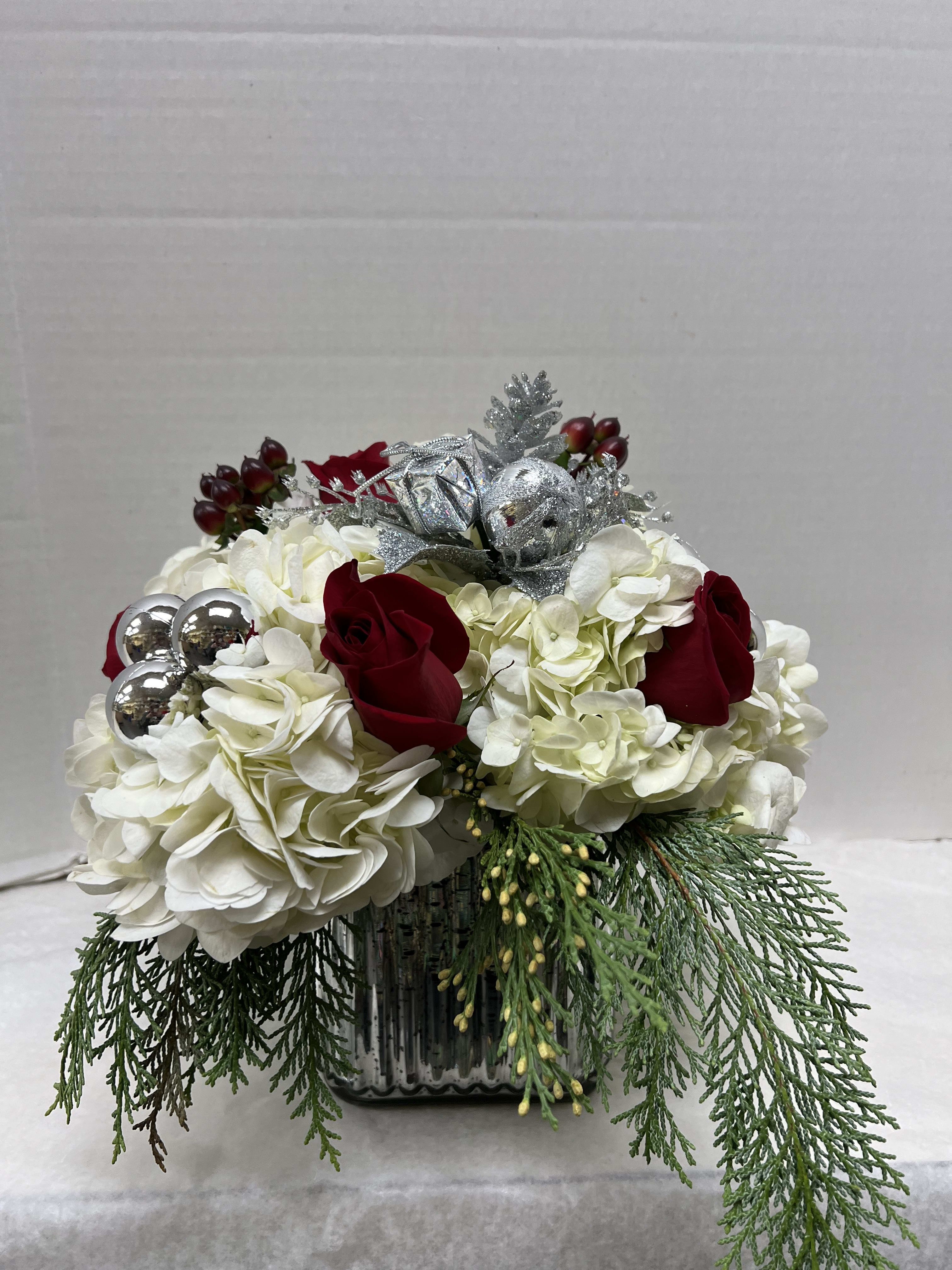 Home for the Holidays  - Send a beautiful holiday arrangement this season to let that special someone know how much you love and care about them