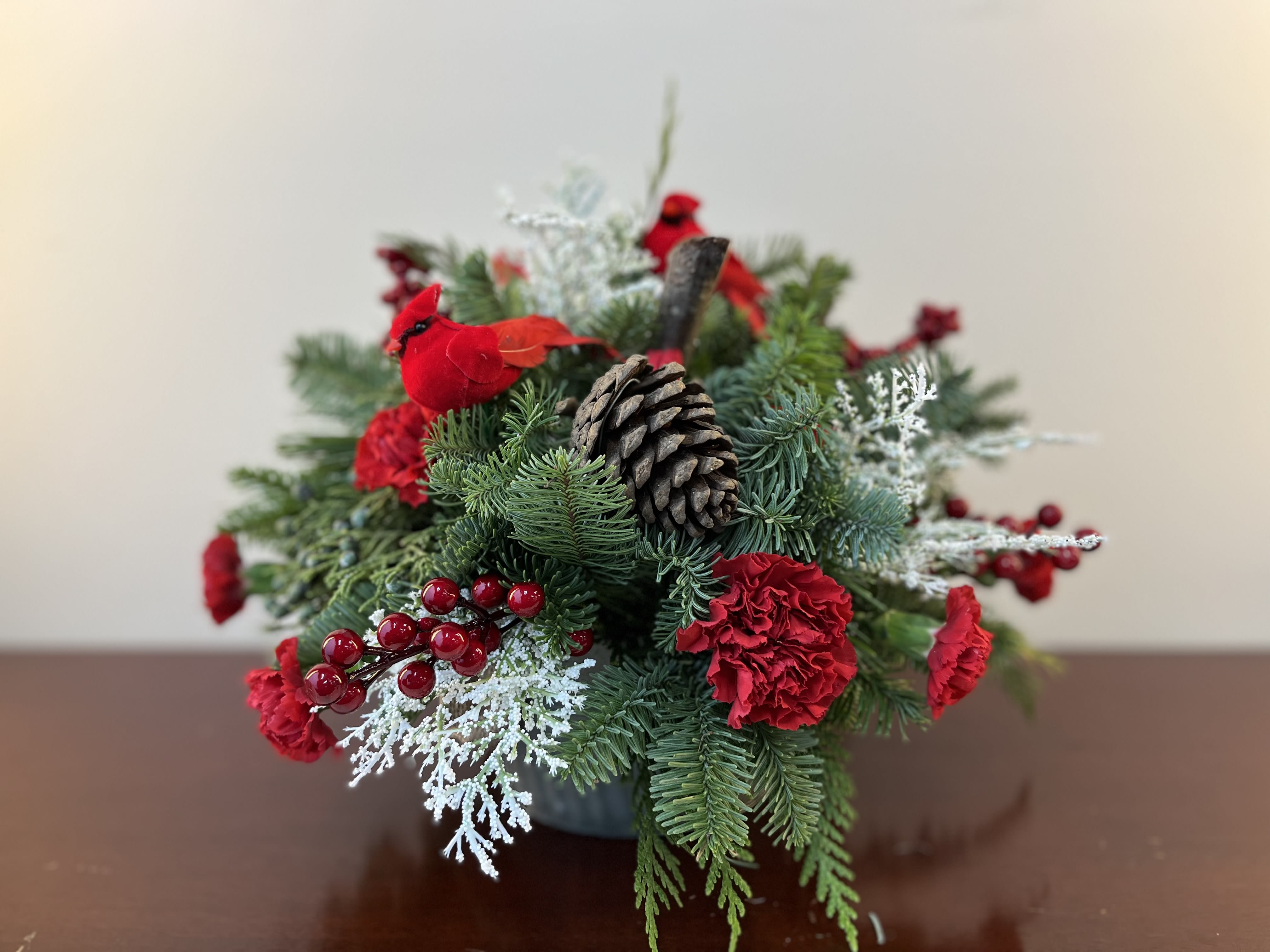 Winter Wonderland - A seasonal mix of lush evergreen paired with delightful cardinals-sure to brighten your Holidays! This rustic mix is perfect for those on your list, who prefer a simpler Christmas