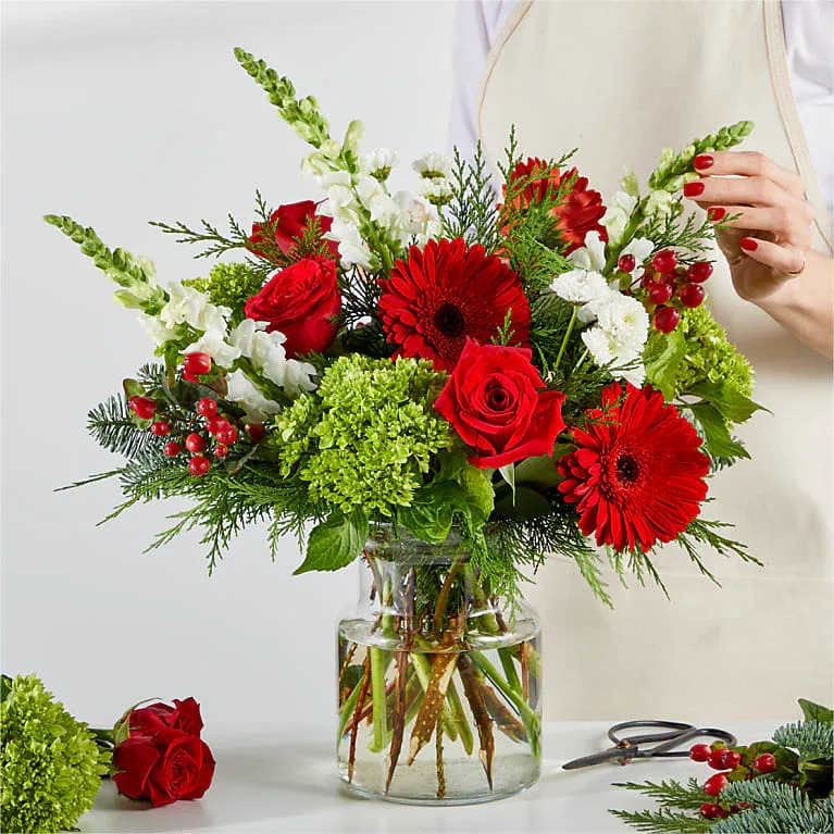 Merry Moment Bouquet - The colors or floral varieties used in this bouquet will vary based on freshness and available. Our Florist Originals Bouquets and are then created using the finest quality flowers. The actual design you or your recipient will receive will be slightly different from the images shown here