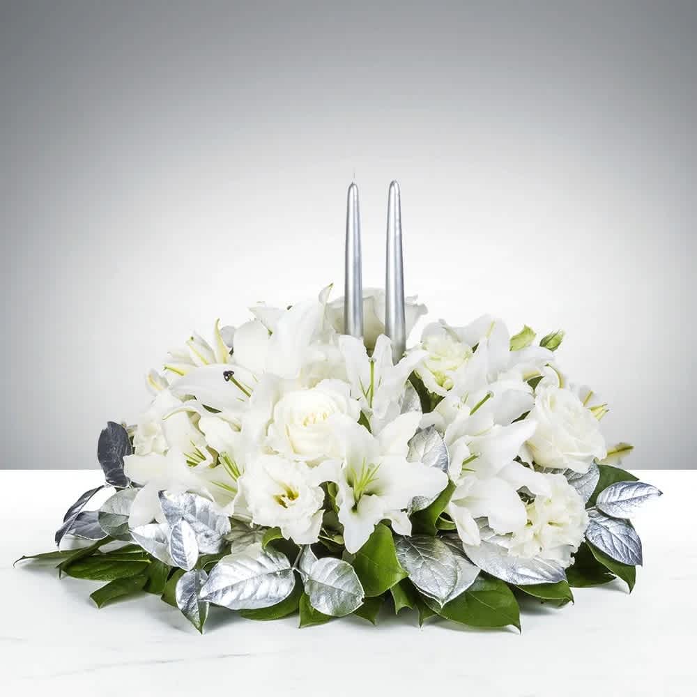 Hanukkah Lights* - This lush centerpiece overflowing with gorgeous white lilies and roses will be the star of this year's Festival of Lights.  As shown premium*