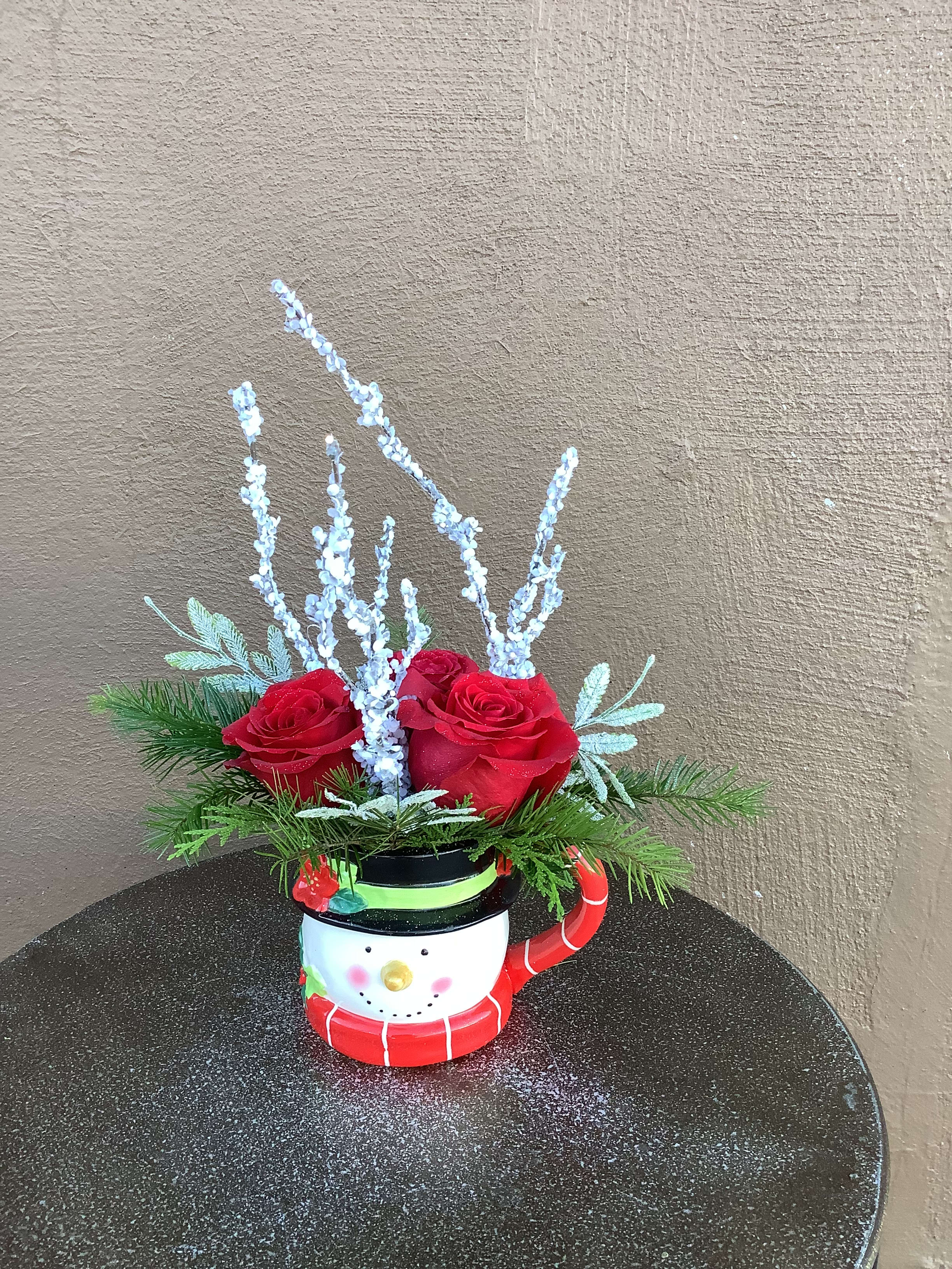 Fun and Frosty - Frosty the Snowman mug with beautiful, Christmas roses, winter foliages, and holiday accents. A perfect keepsake. 
