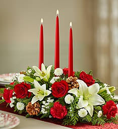Twilight Glow Centerpiece Premium - Beautiful long and low centerpiece with white lilies, red roses red carnations, christmas greens centerpiece with Candles Lilies, Red Roses Red Carnations, Christmas greens 2 Candle Centerpiece 
