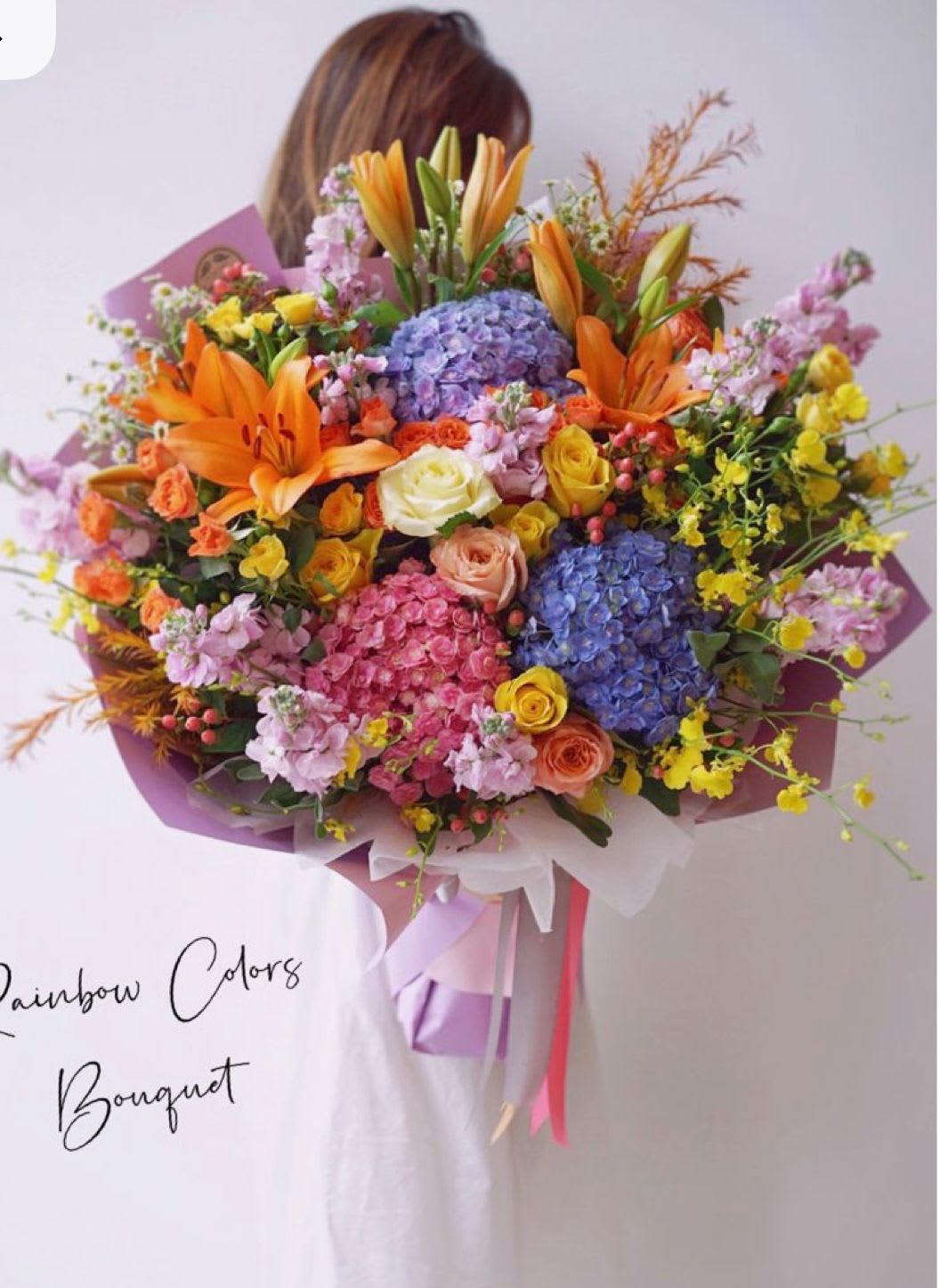 Rainbow color bouquet by Luxury Florist - This beautiful bouquet was created with the vibrant colors of life, this beautiful flower bouquet is perfect for any occasion, birthday, anniversaries, just because, or for the special someone