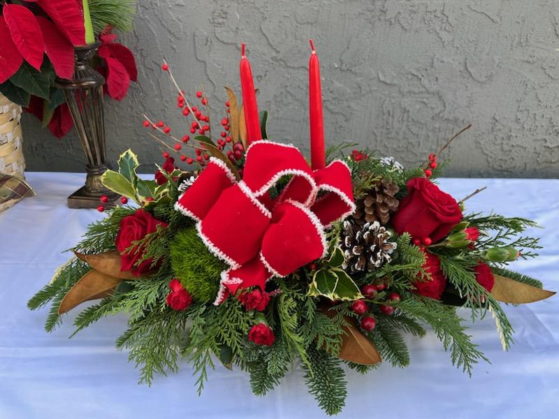 Carousel Christmas Centerpiece - A beautiful centerpiece for Christmas, with a red ribbon and two red candles!