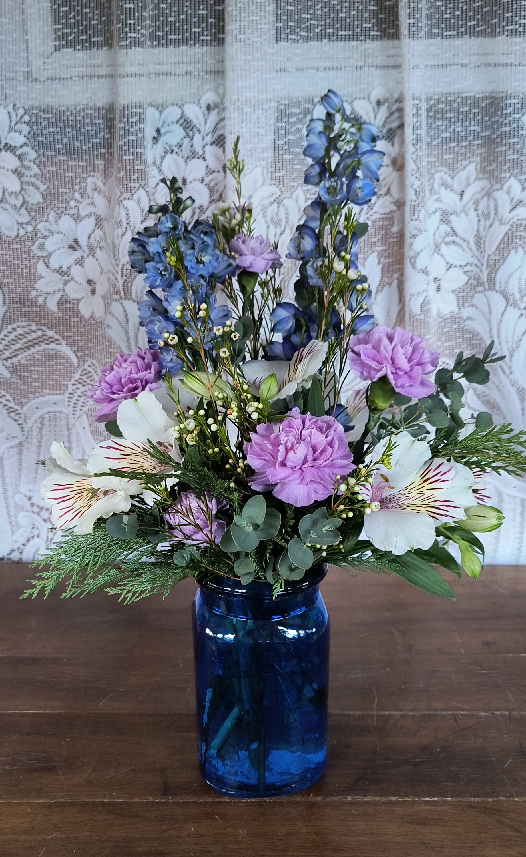 Chill - The beautiful soft colors of winter's chill in flower form. Flower varieties may vary.