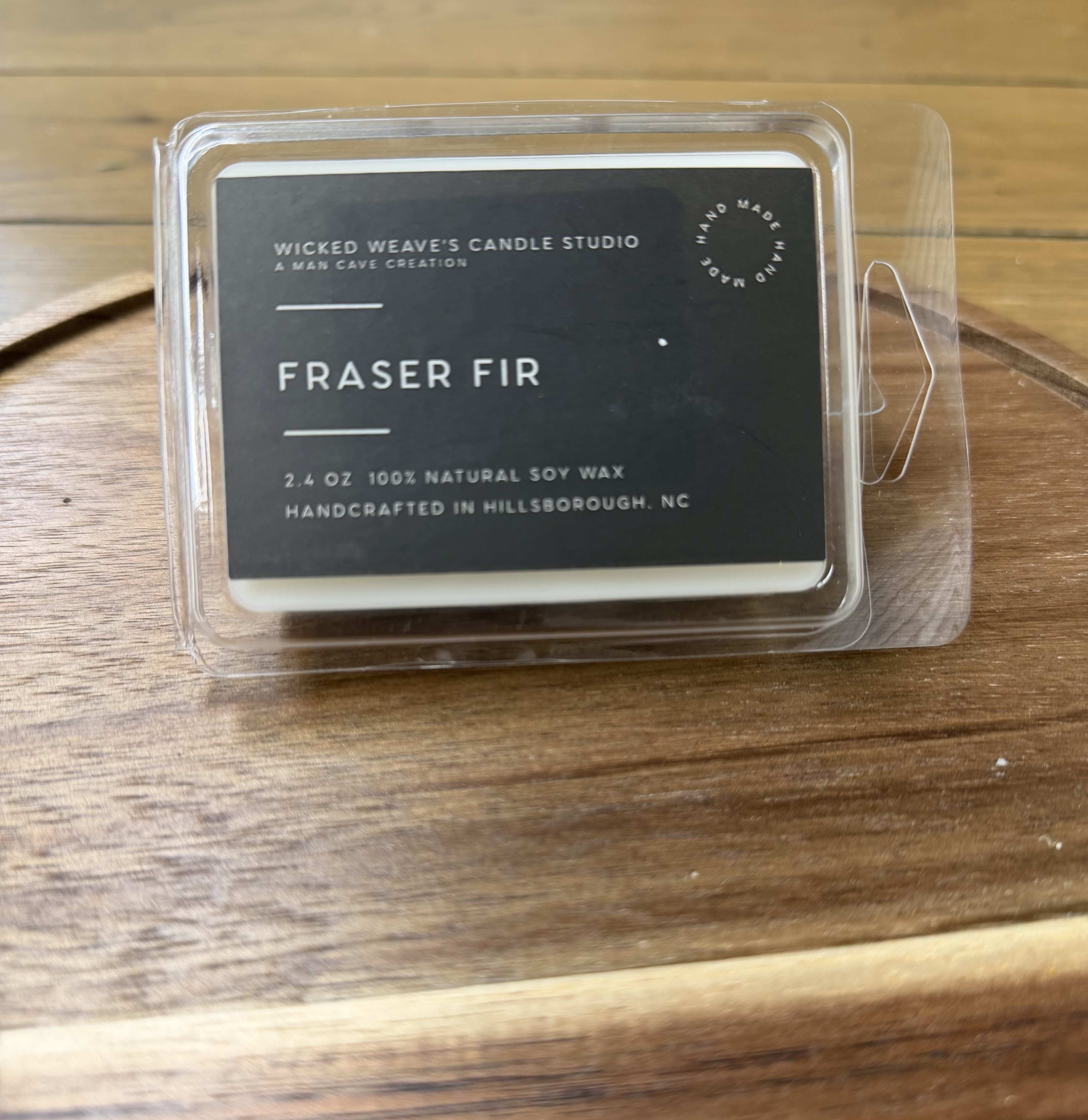 Fraser Fir Soy Wax Candle Melts (2.4oz) - Fraser Fir begins with top notes of cypress and zesty lemon peel that fold into woodsy mid notes of evergreen and cedar. The rich base of fir, amber, and moss evokes fond memories of decorating a freshly-cut Christmas tree. 40 hr minimum burning time. Enjoy!