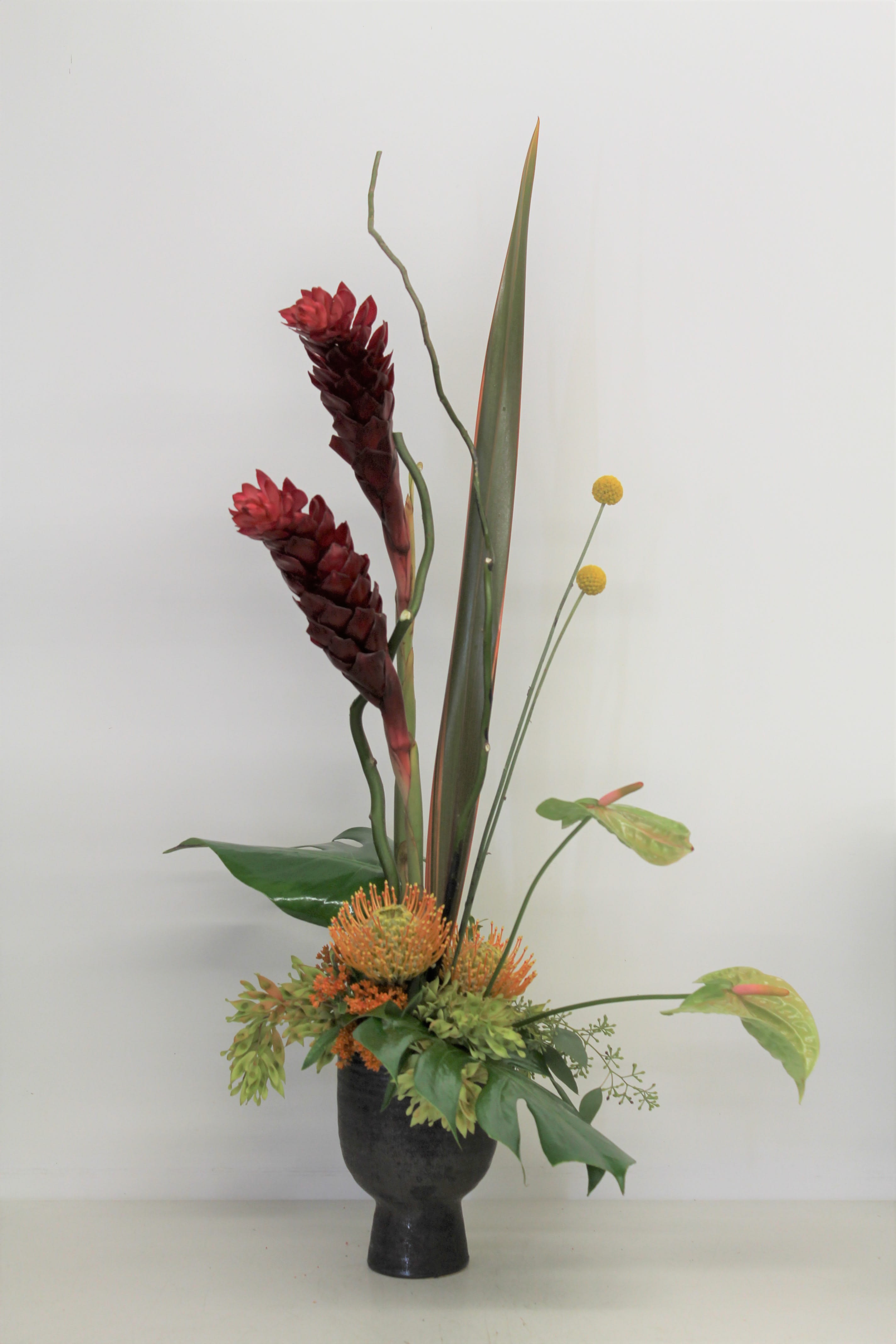 9145 - Some of the flowers in the arrangement are seasonal. Please call to make sure they are available.