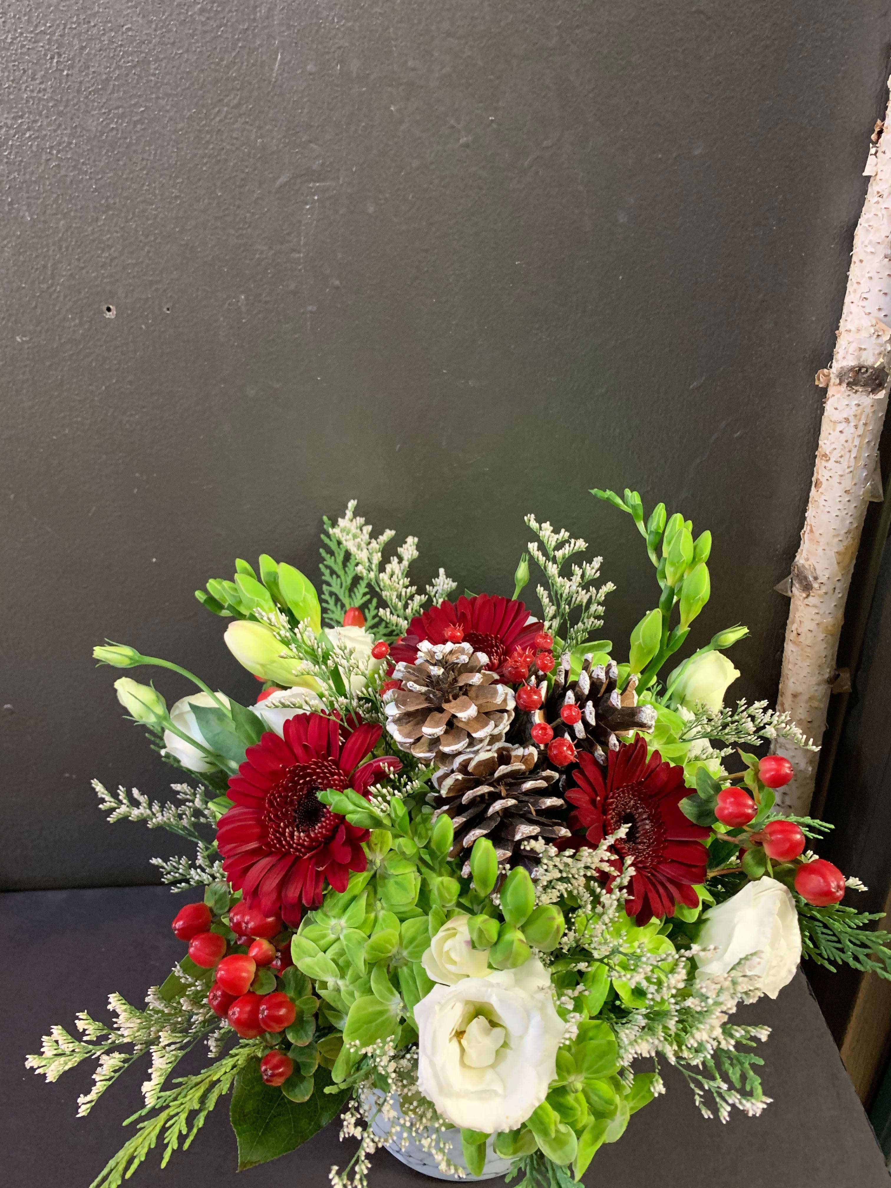 Christmas Table Centerpiece  - A low vase arrangement filled with festive fun for the table.