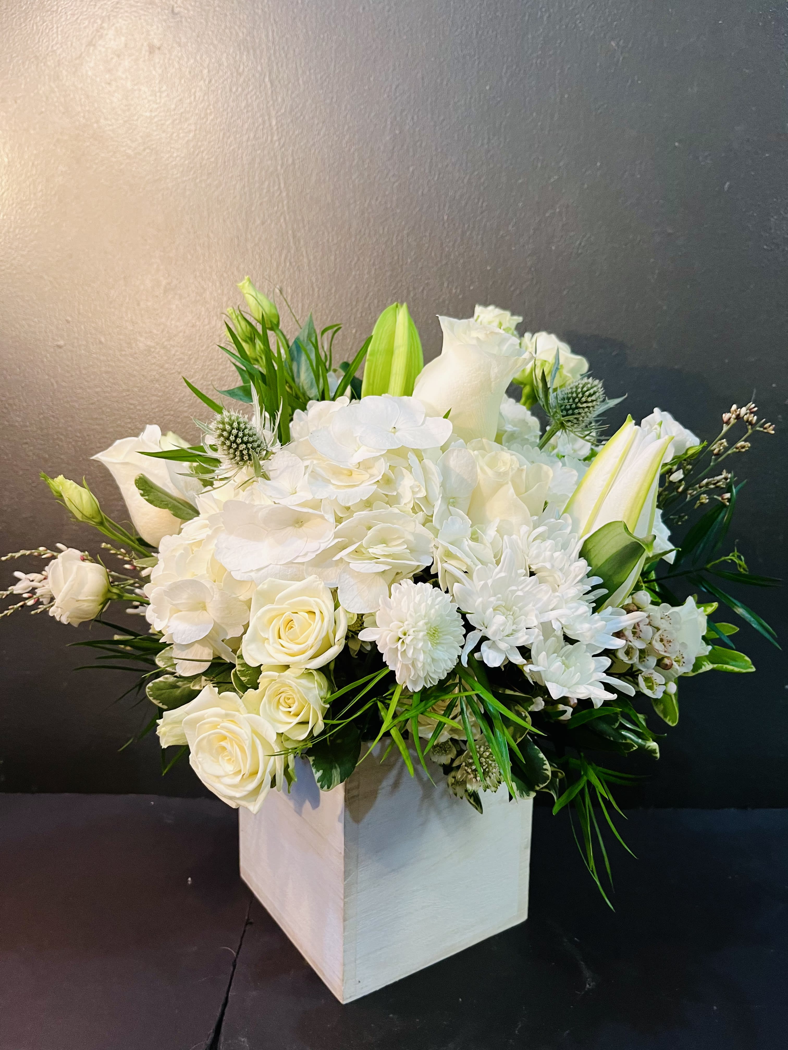 Snowy Field - Snow can be a controversial topic. It’s a gift from the friendly sky or a curse from the heavens, depending on who you ask. It’s time to shovel that controversy aside with the Snowy Field arrangement. All of the beauty, none of the inconvenience - only what you love about this snowy season.