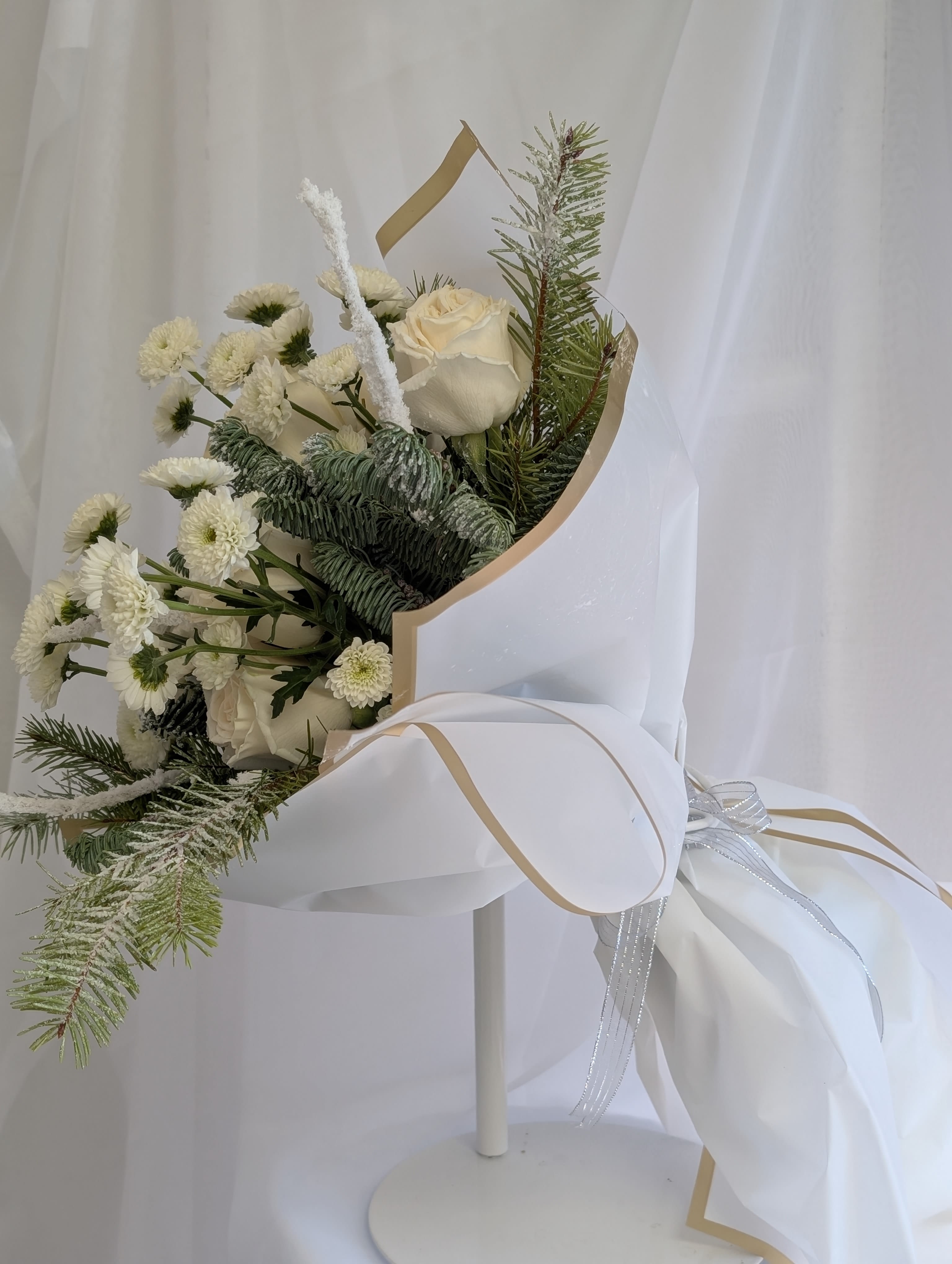 Winter Wonderland - Get cozy with seasonal greens and whites beautifully hand wrapped. The scent of crisp winter greens will fill your home and lift your mood. 