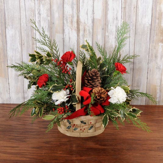 Holly Jolly Basket (LG) - This holy basket comes filled with fresh holly, cedar, pine cones and a bow. 