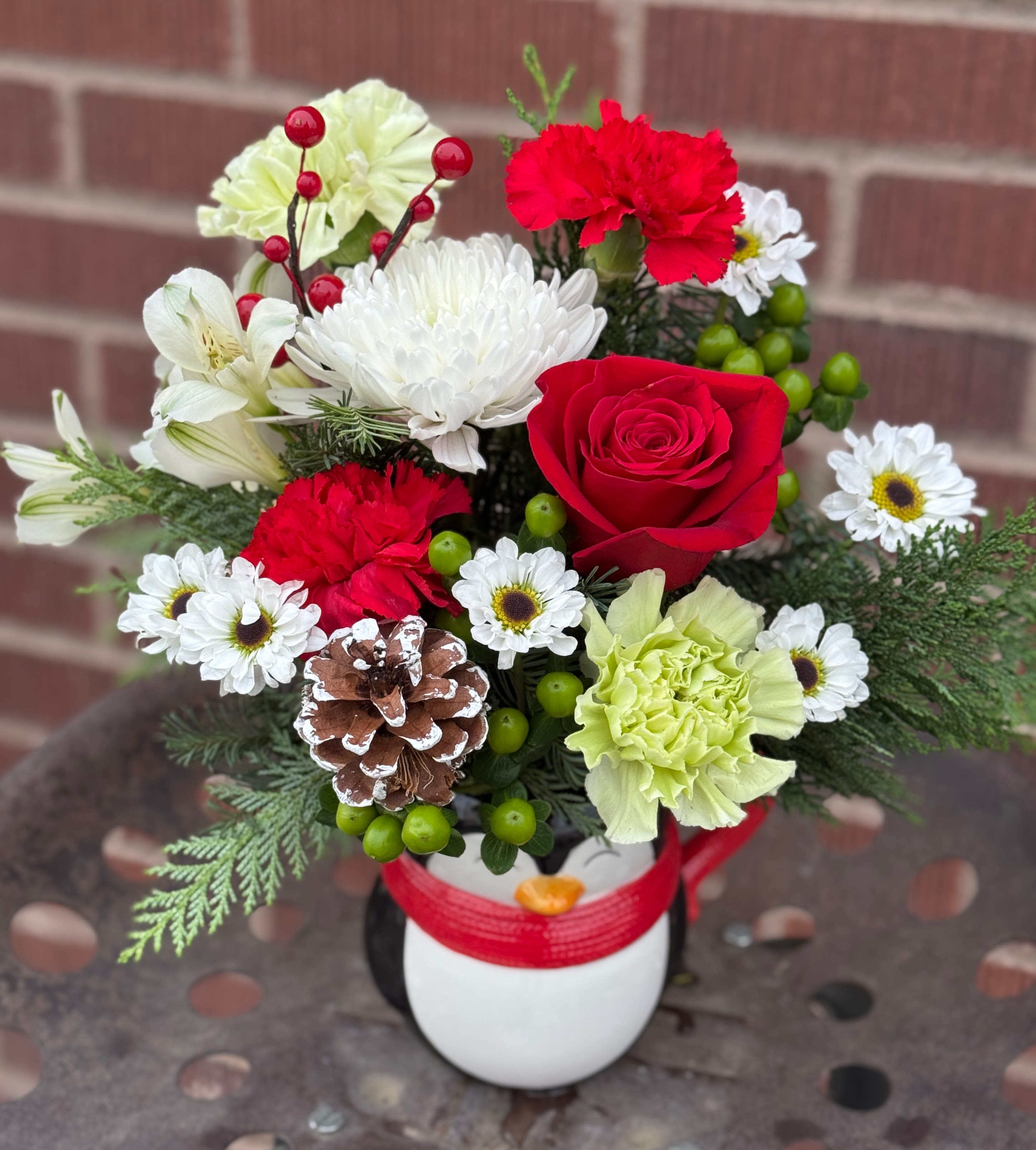 Plucky Penguin Mug - In an adorable, food safe ceramic penguin mug perfect for some hot cocoa by the fire in festive colors of red white and green with fresh pine. 