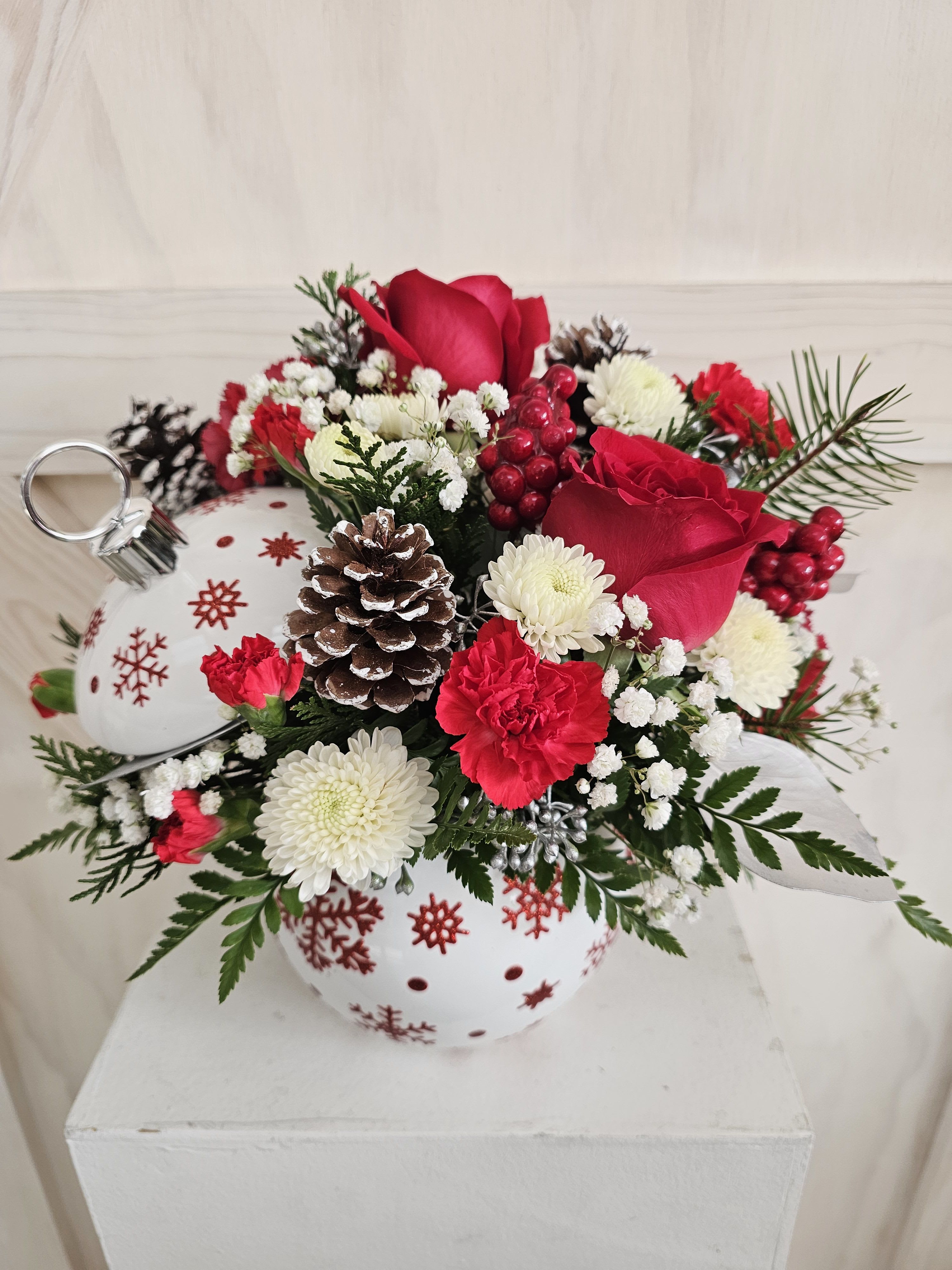 Holiday Ornament Bouquet - This ornament comes with a lid and can also be used as a candy jar after its bouquet use. Made with red or white roses, carnations and white filler flowers plus red or white ornaments.  