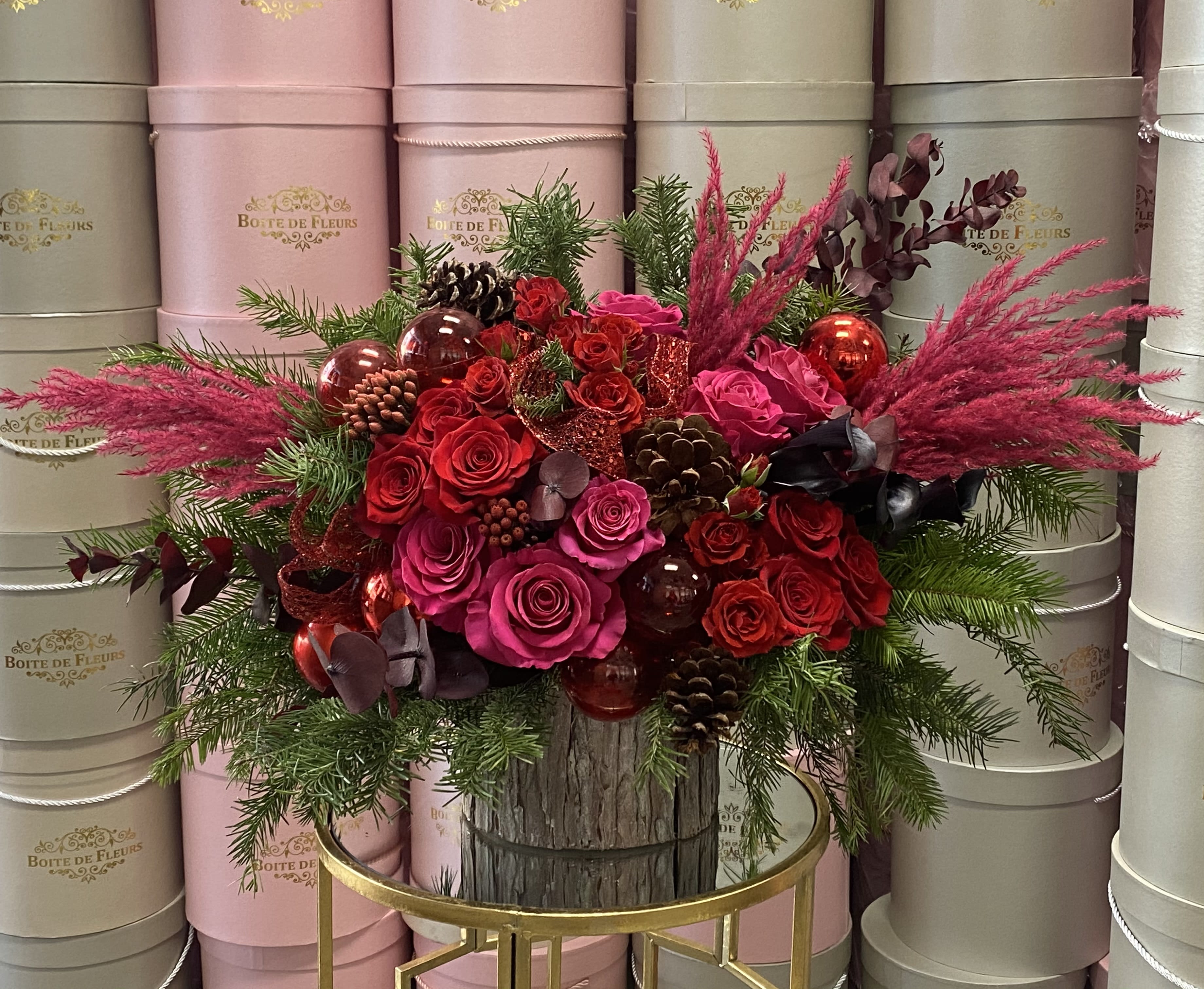 Merry everything - Roses, tree branches, pines, ornaments and callas  and more.