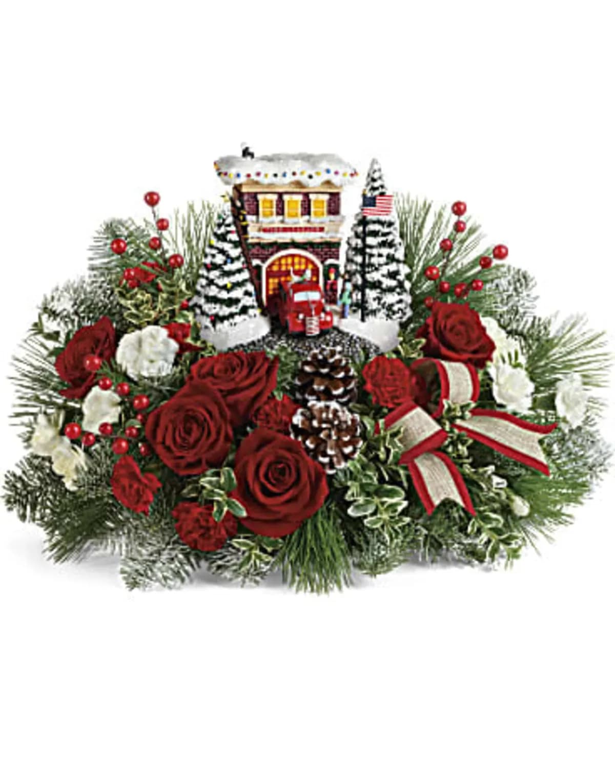 Thomas Kinkaid's Keepsake Fire Station - This holiday season, celebrate the heroes among us! Set atop a magnificent bouquet of festive roses and fresh Christmas greens, this hand-painted, light-up Thomas Kinkade sculpture is bursting with vintage fire station charm! This charming gift features red roses, white carnations, red and white miniature carnations, oregonia, noble fir, and white pine. Delivered in Thomas Kinkade's Festive Fire Station Keepsake.