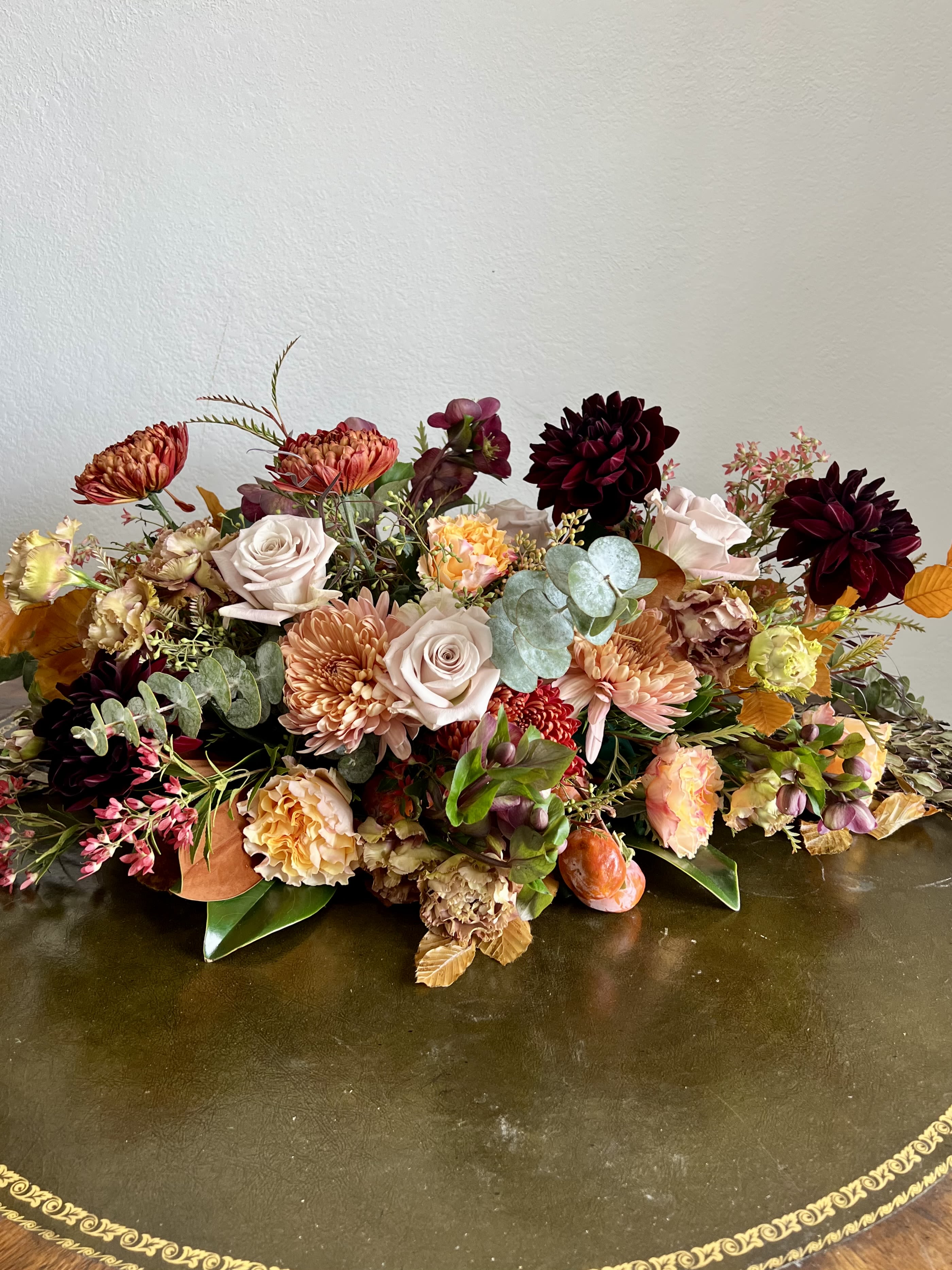 Cornucopia  - A beautiful center piece for a rectangular table. The Standard is for a table of 6. The Premium is for a table of 8. The Deluxe is for a table of 12. 
