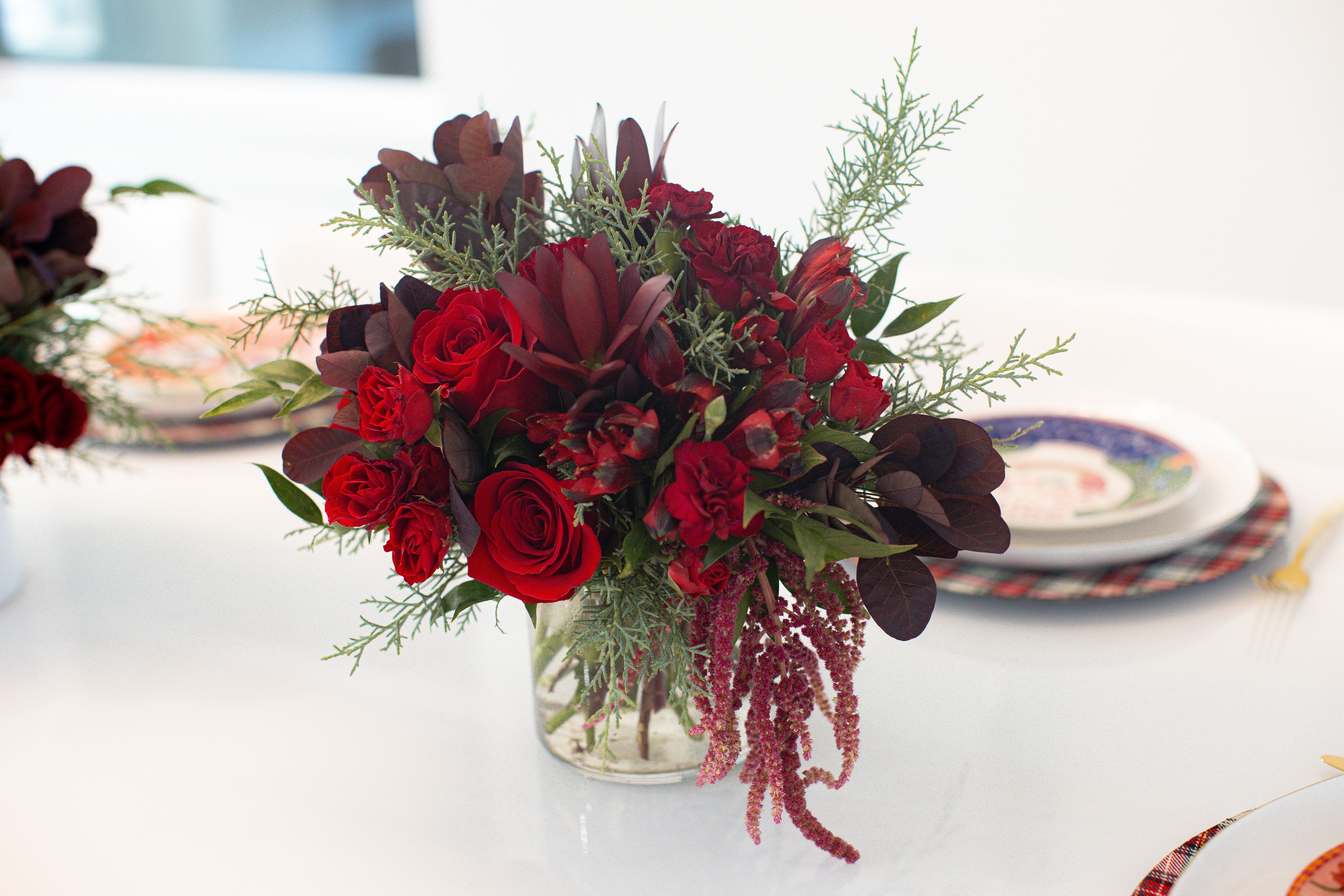 Christmas Arrangement - Our Christmas arrangements are a hit each year! Designers choice, but sure to be filled with Christmas Cheer and greens that smell divine! 