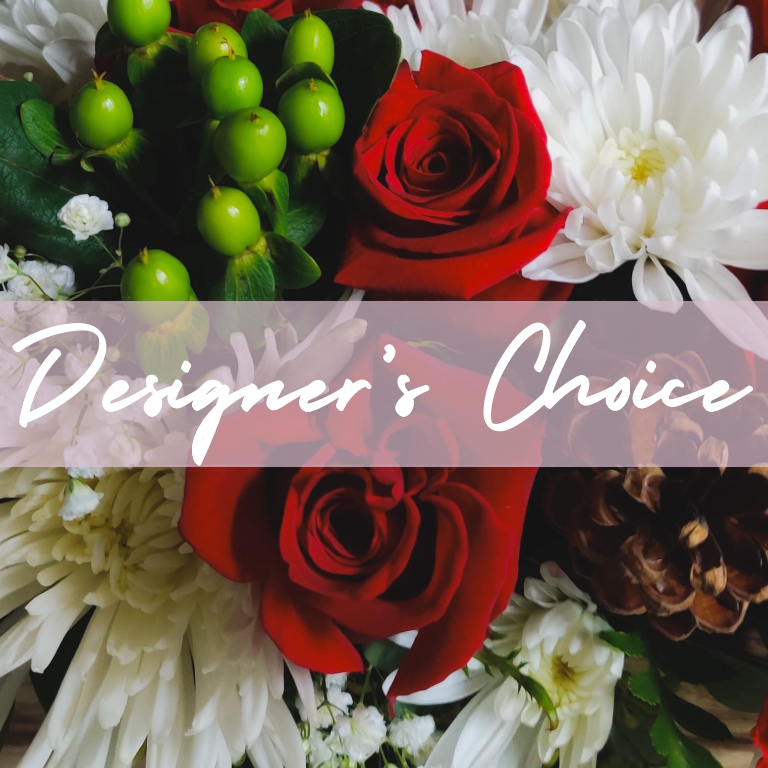 Designer's Choice- Christmas - Let our designers create a festive Christmas themed arrangement just for you! If you would like certain colors or flowers please indicate in checkout notes. Example: &quot;no roses&quot; &quot;white and red flowers only&quot;