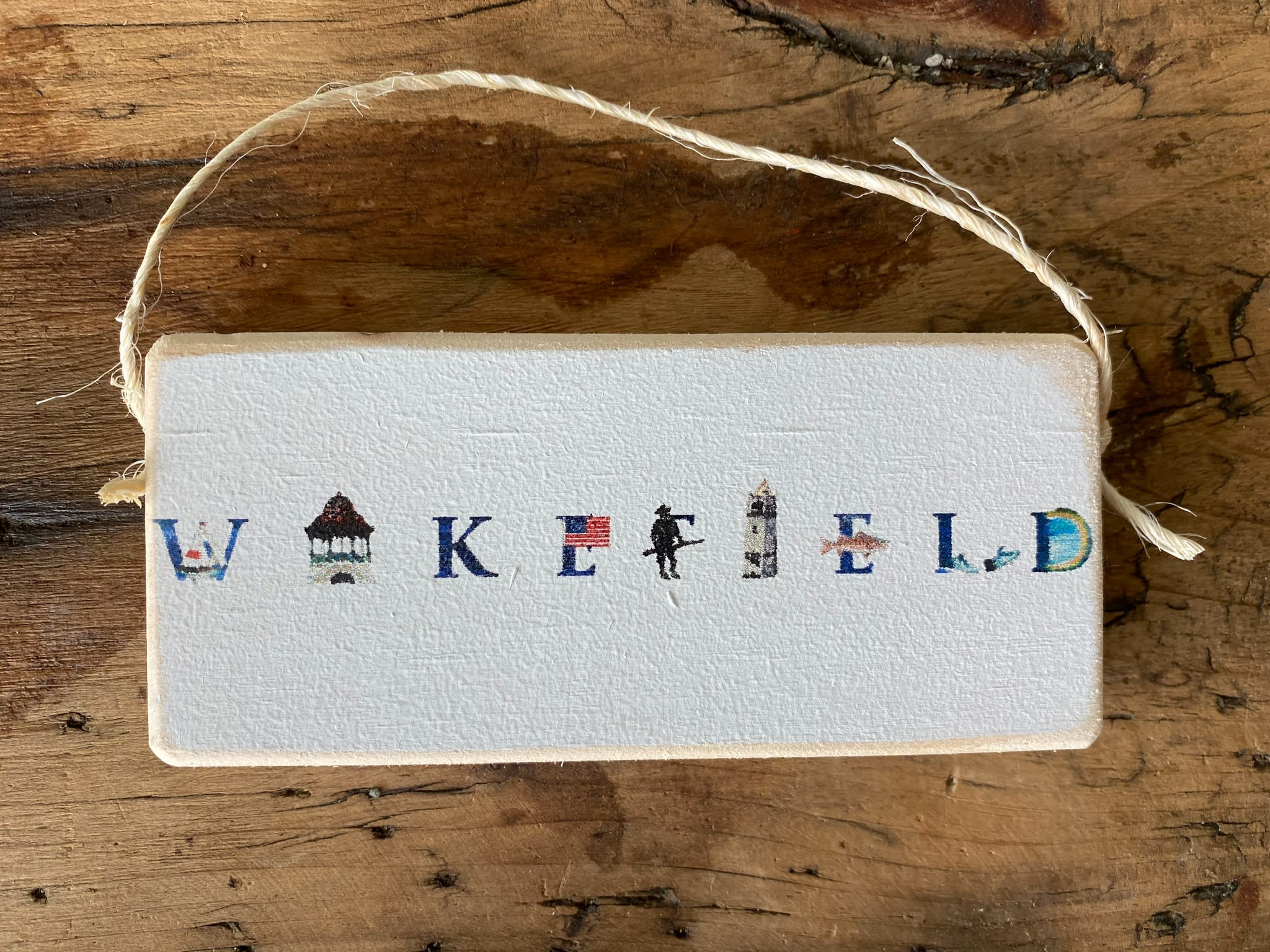 Wakefield Landmark Wooden Ornament  - 6x2 with jute hanger.  Designed exclusively for Sweetbay. Made in Massachusetts featuring some of our favorite local images. 