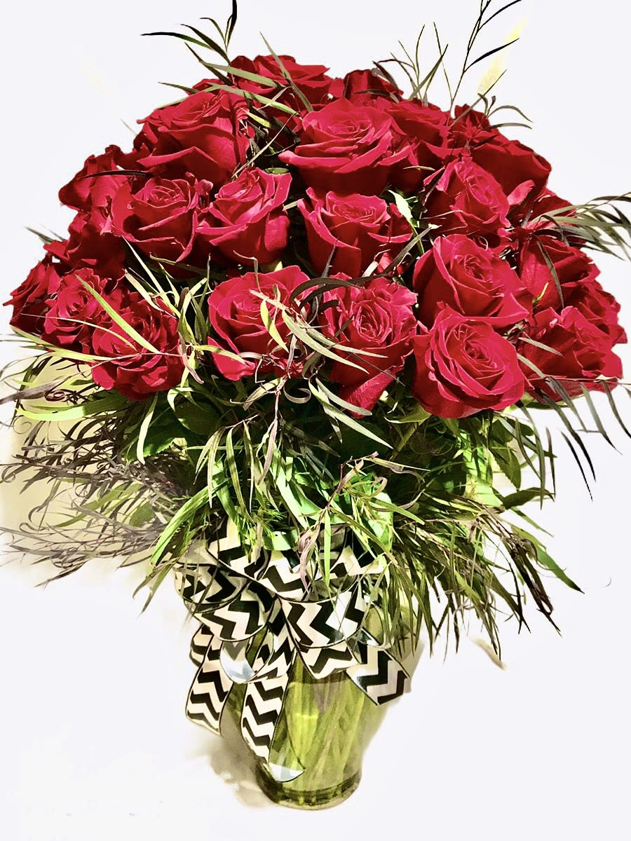 Five Dozen Roses  - The ultimate gift.  Five Dozen Premium Roses Vased will be sure to impress.  Order in advance if you would like to specify rose color or varietal.