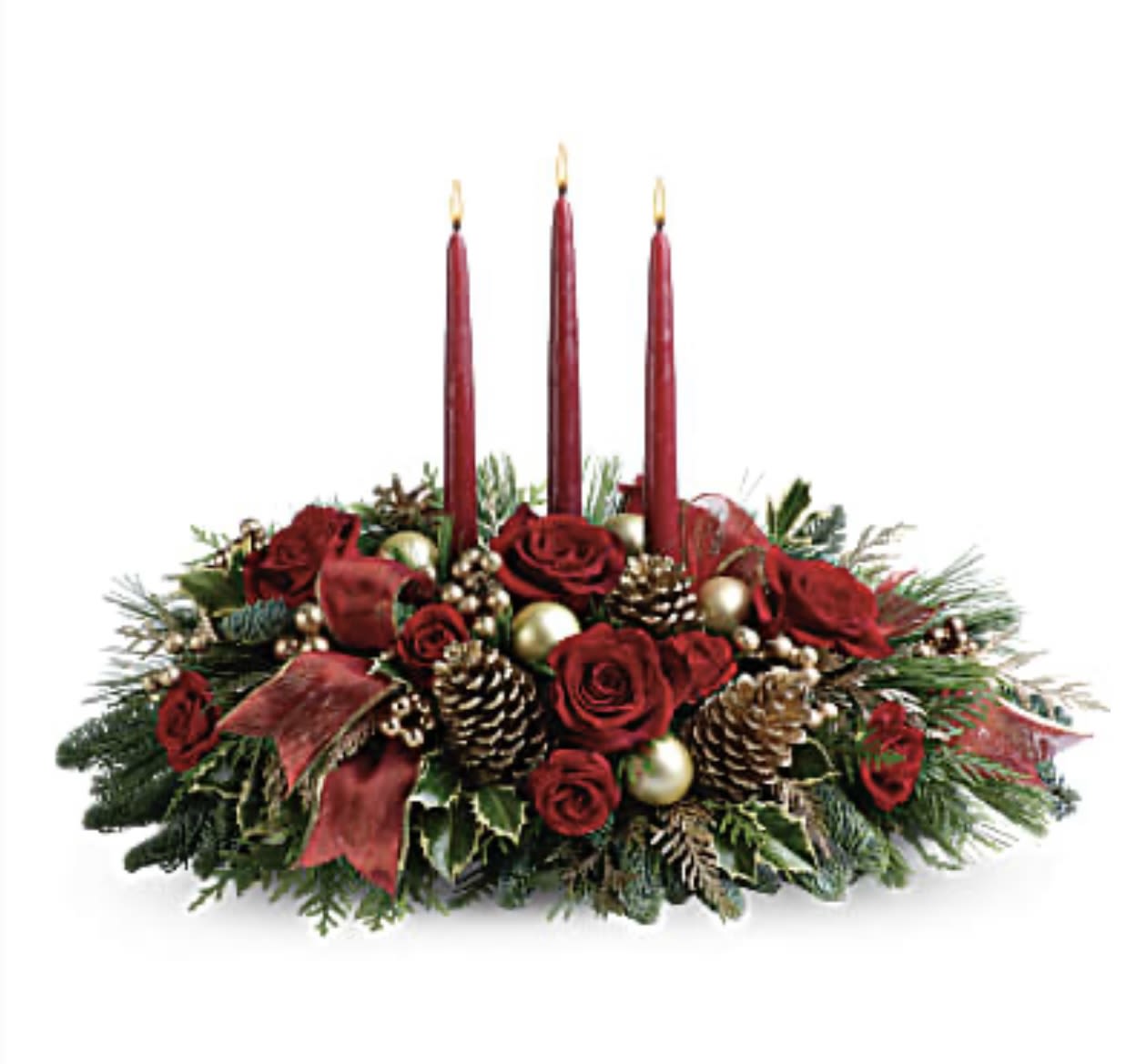 All Is Bright - All is calm, all is bright…well, at least we can promise the latter with this luminous arrangement! Gather family and friends together for a holiday meal around this traditional Christmas centerpiece featuring pinecones, holly, noble fir and Christmas candles. 'Tis the season to shine! A fresh centerpiece of holly, noble fir, white pine, flat cedar, roses and spray roses is decorated with golden berries, Christmas ornaments, pinecones and three red taper candles. A sheer, gold-edged organza ribbon adds to the opulence. Orientation: All-Around 