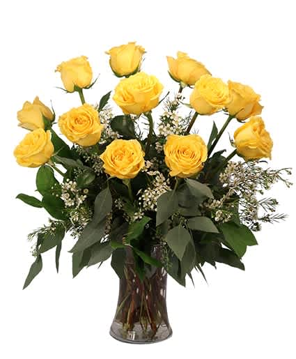 Dozen Yellow Roses - These roses will light up any room! Our Dozen Yellow Roses arrangement is bursting with light, love, and sunshine. Inspiring and majestic, everyone who sees this sunny bouquet will feel brighter and sunny. It's sure to bring a smile to anyone's face!