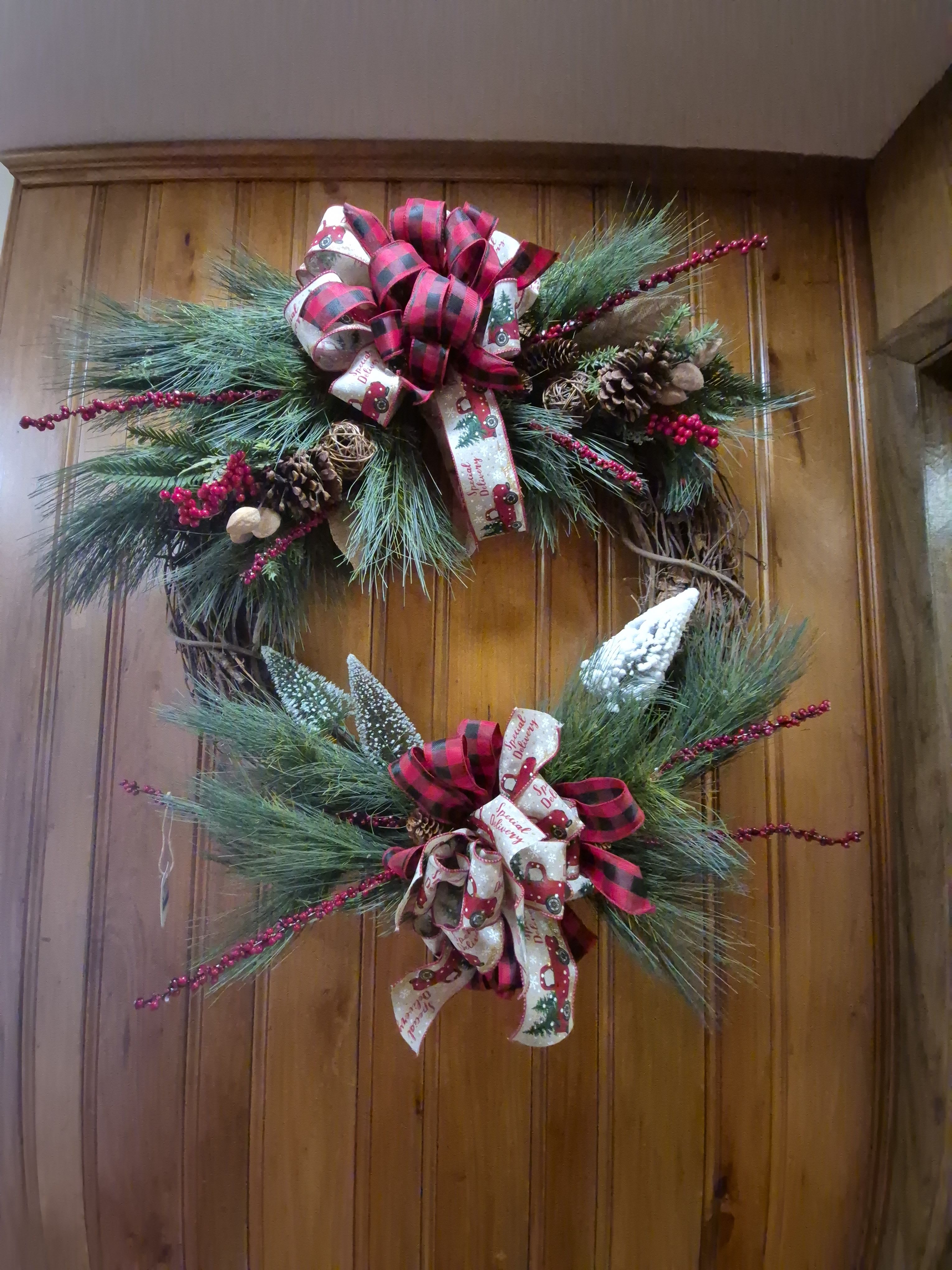 Grapevine Christmas Wreath - This XL Wreath is Designed on a 22-inch Grapevine wreath. The beautiful ribbons and bows of buffalo plaid truly gives this wreath a wow effect that would be perfect to add to your Christmas Decor or send as a gift. 
