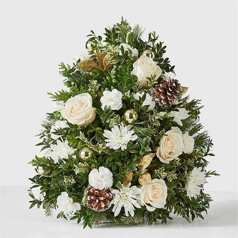 Snowed In Tree - No need to brave the cold this winter when you can bring the beauty of the outdoors in with our Snowed In Tree, a handcrafted mini tree featuring icy white blooms. This gift can make birthdays brighter, holidays more cheerful, and everything in between.