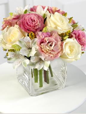 Blushing Beauty - A whisper of white, a touch of pink is the reci[e for the Blusing Beauty vase arrangement.  Lovely white, pink and lavender roses intermingle with white Peruvian lily to make a simple, feminine statement.  Great value as well!
