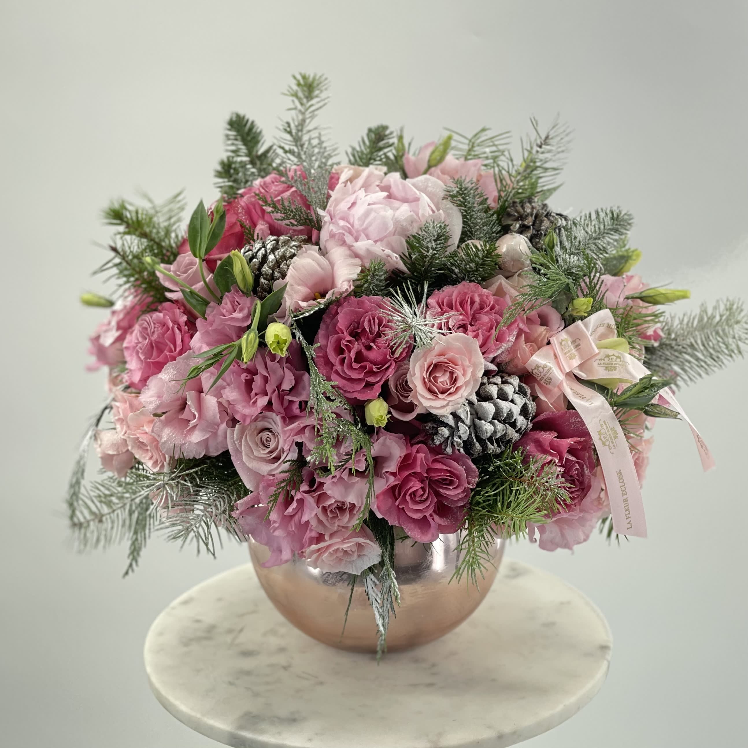 Holidays vase  - Beautiful Christmas Vase with mix flowers                                                                      Standard – pictured  Deluxe – the amount of flower will be bigger. We will also put more premium flowers into the arrangement. Premium – the vase size will be changed for the bigger one and a lot of premium flowers will be added to the arrangement. 